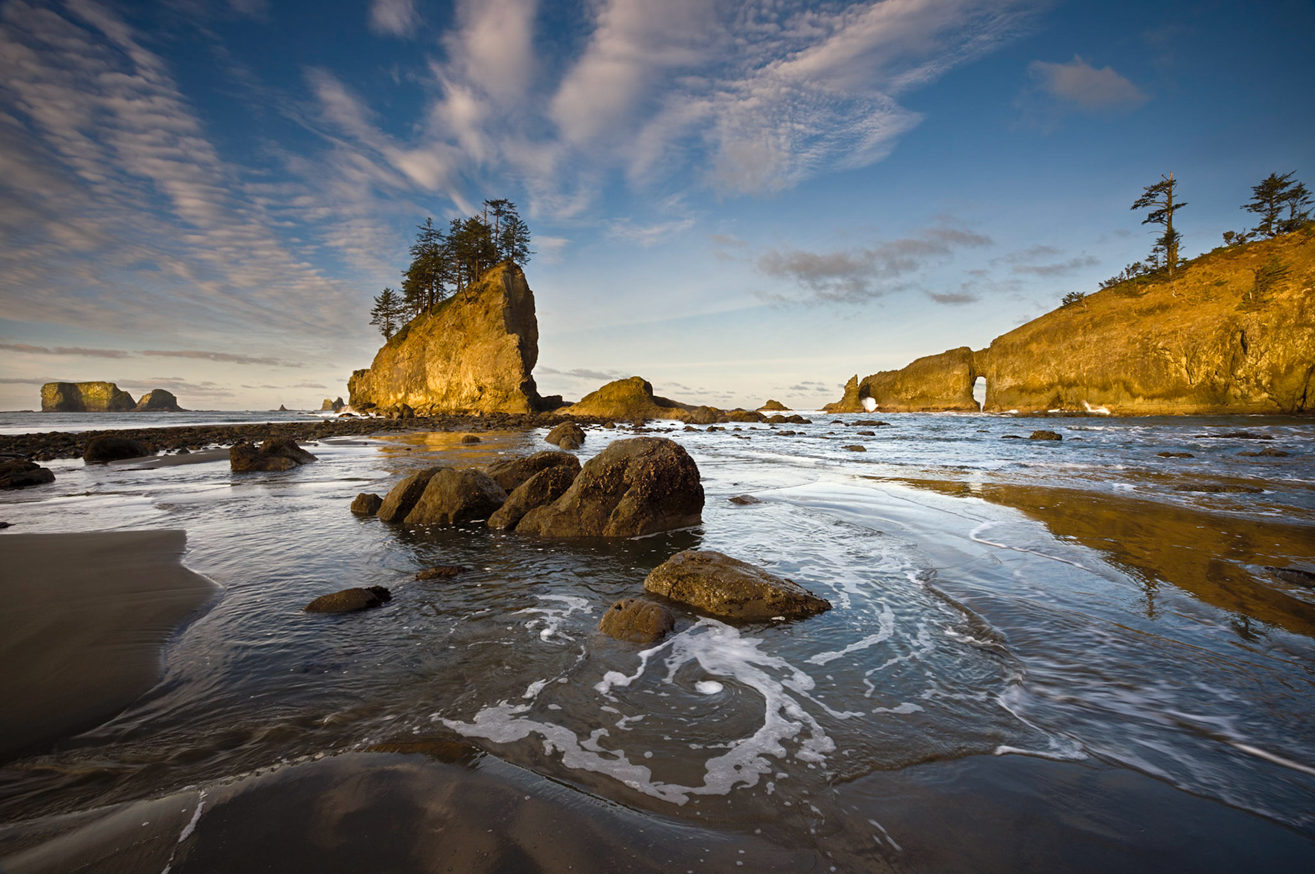 Here is another sunrise variation taken on a gorgeous morning run to Second Beach a few months back...I really liked the reflections and water movement in this one!   Thank you for viewing, voting andor any constructive comments!