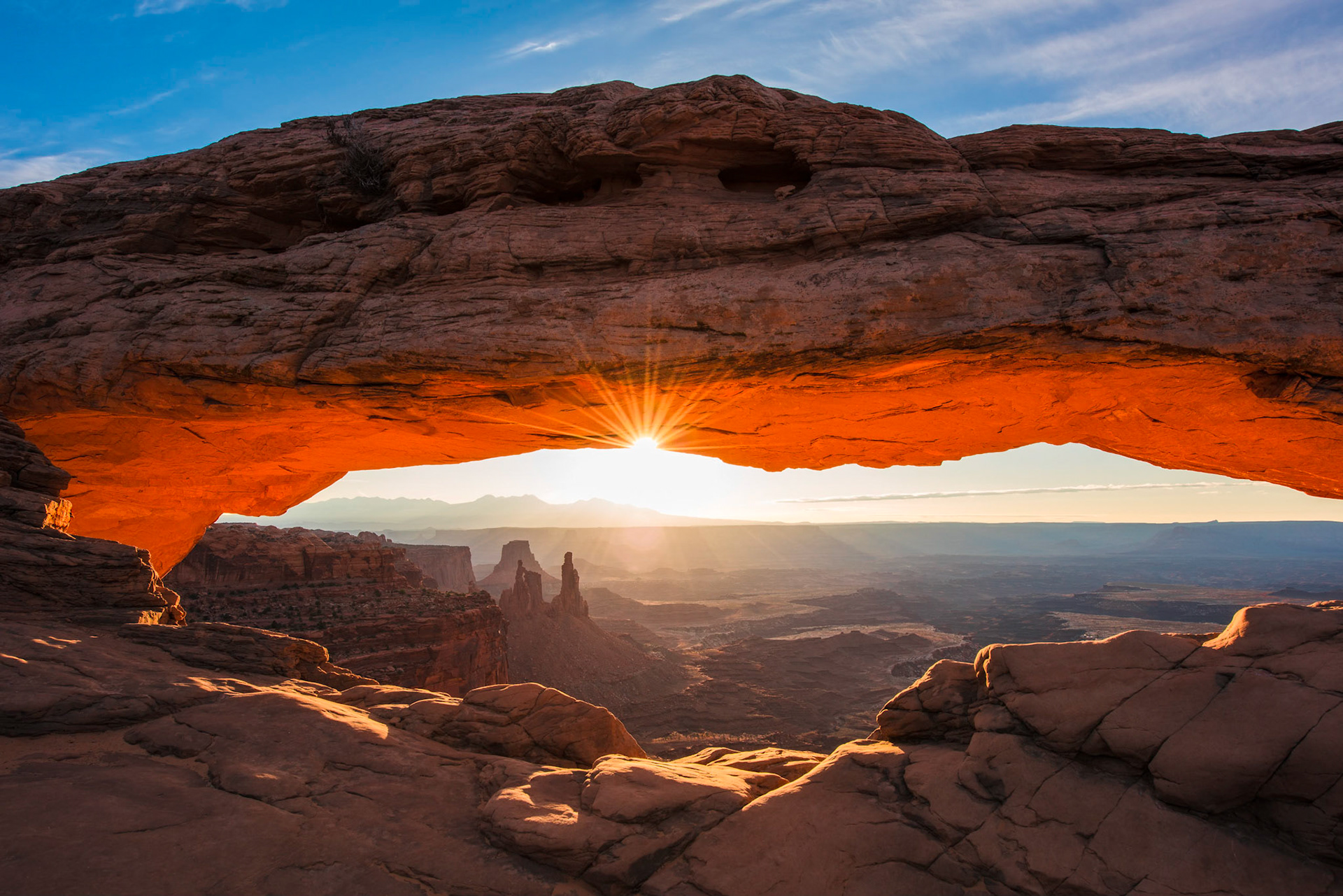 My first trip to the Southwest so naturally I had to try my take on a few of the classics...patience please!         My buddy Tom Smith and I definitely enjoyed this very beautiful morning and view from Mesa Arch. We especially liked meeting and visiting with the many other photographers who made the trek there  for the same reason...didn't appear that anyone left disappointed!    Thank you for viewing, voting and/or any constructive comments!
