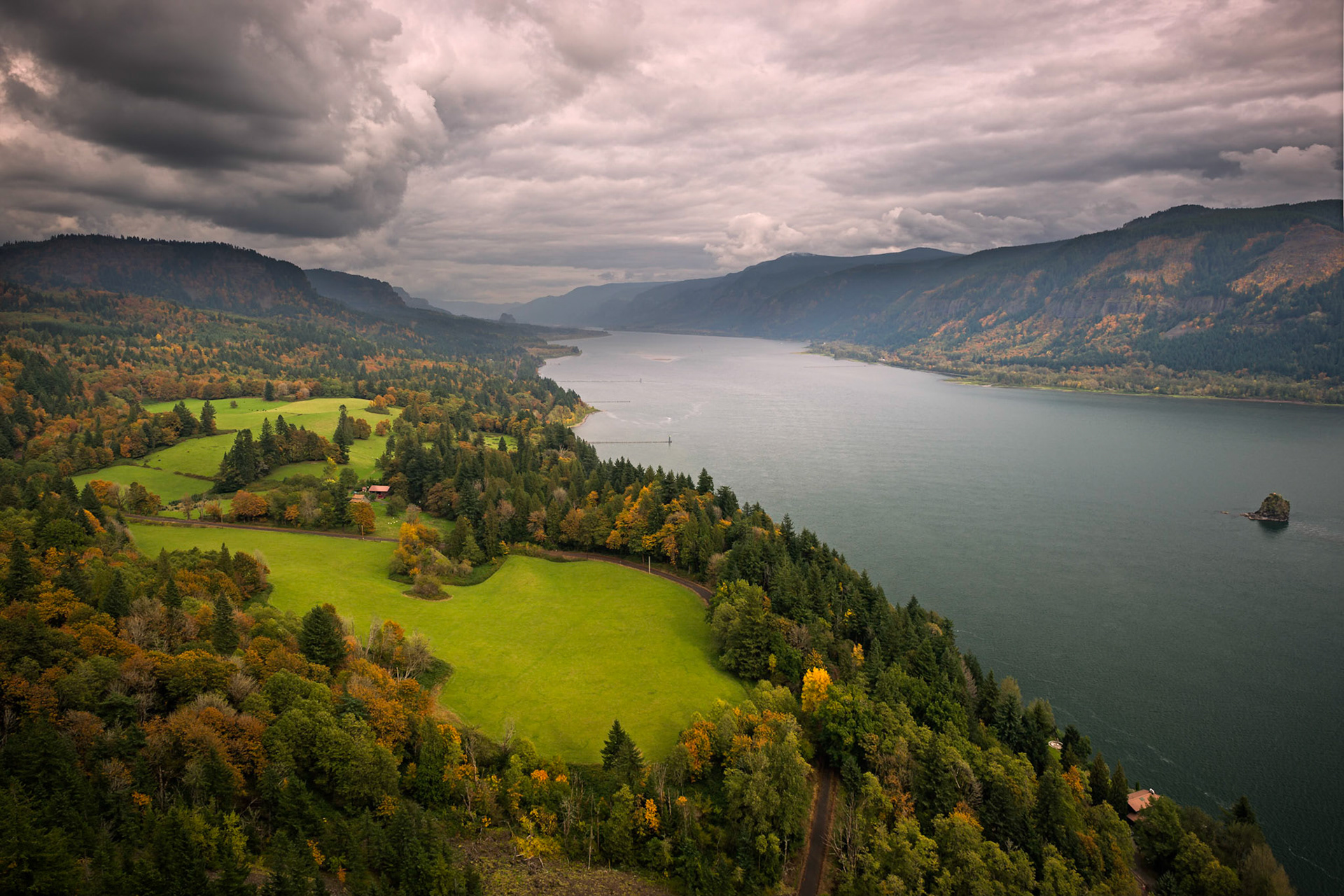 A beautiful Fall evening at the Columbia River Gorge. The mighty Columbia River (fourth largest river by volumn in the United States) seperates the borders of  Washington State and the State of  Oregon. This image is taken from the Washigton side.   Thank you for viewing, voting and/or any constructive comments!