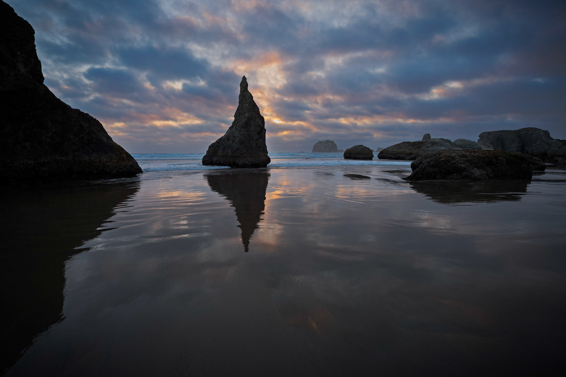 This was our last sunset attempt at Bandon, Oregon coast (Wizard's Hat) on  our most recent road trip.  Though things didn't look too promising at first (looked like nothing but bald sky), the wind shifted dramatically and we were able to snap a few frames as the fast moving clouds rolled in.    The title is in reference to the old (1970's) cartoon featuring "Mr. Wizard" . This scene/rock at Bandon looks very much like the  Wizard's hat that he wore.  Mr Wizard's most most famous line in the show was "Drizzle, Drazzle, Dradle, Drone time for this one to come home".   Thank you for viewing, voting and/or any constructive comments!