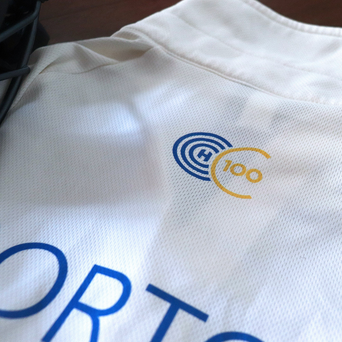 Centenary monogram on shirt