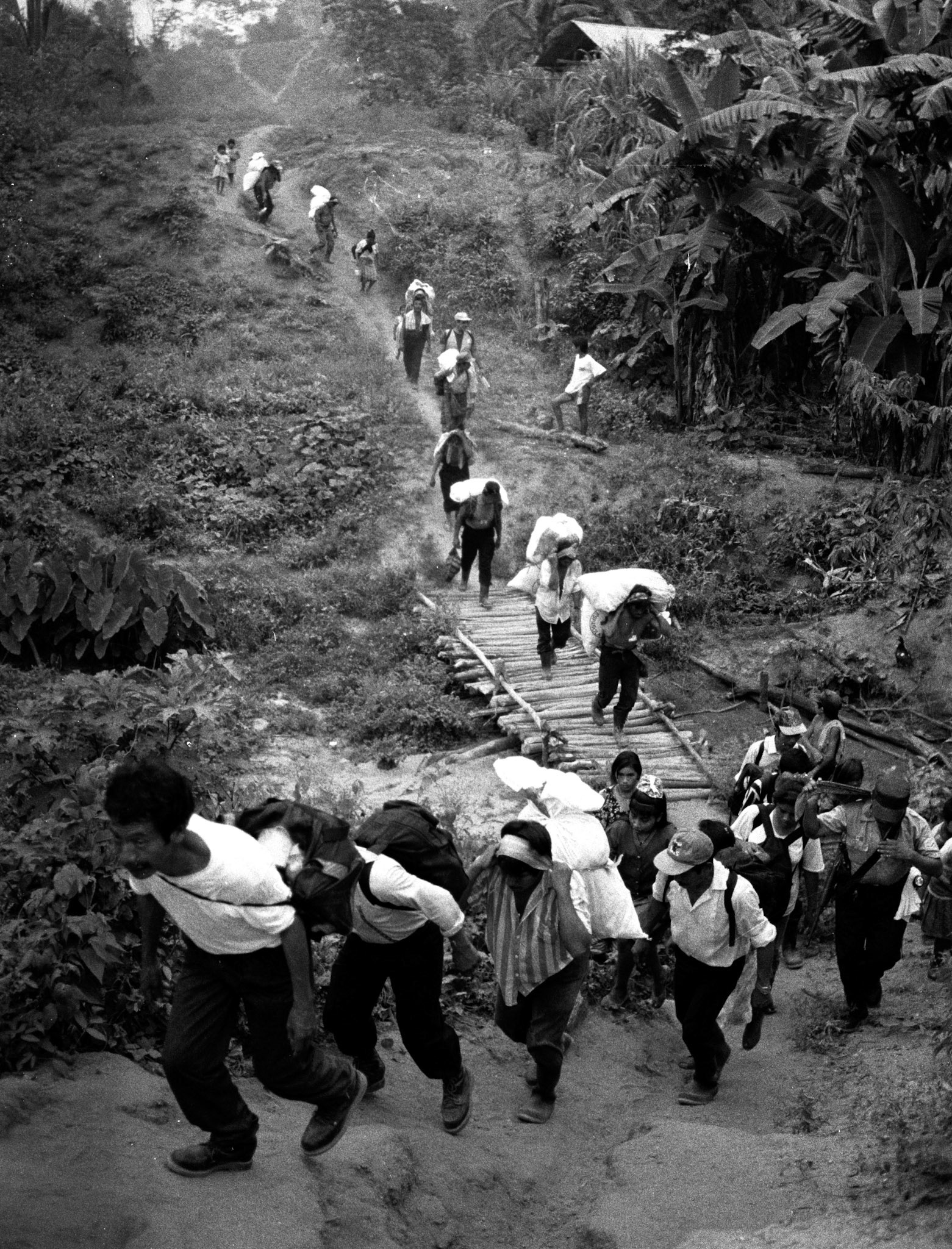 Stock image of ex URNG guerrillas returning home after demobilizing in the Ixcan Jungle- many feared they would be killed and their homes burned down by people in Cuarto Pueblo, Guatemala