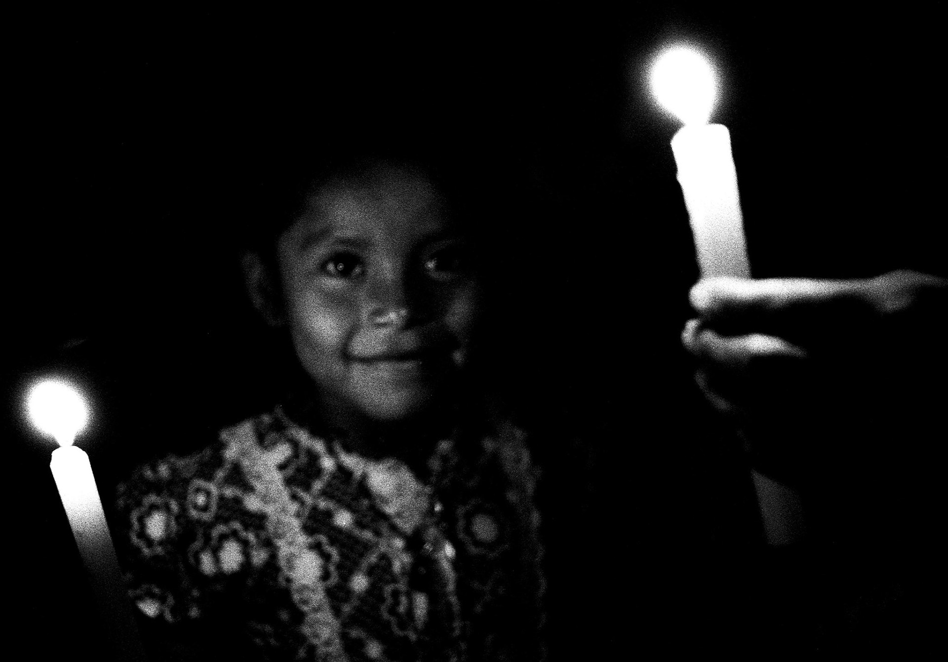 A young Mayan girl at an Easter celebration in an open church in the return community of Los Angeles, in the Ixcan jungle.