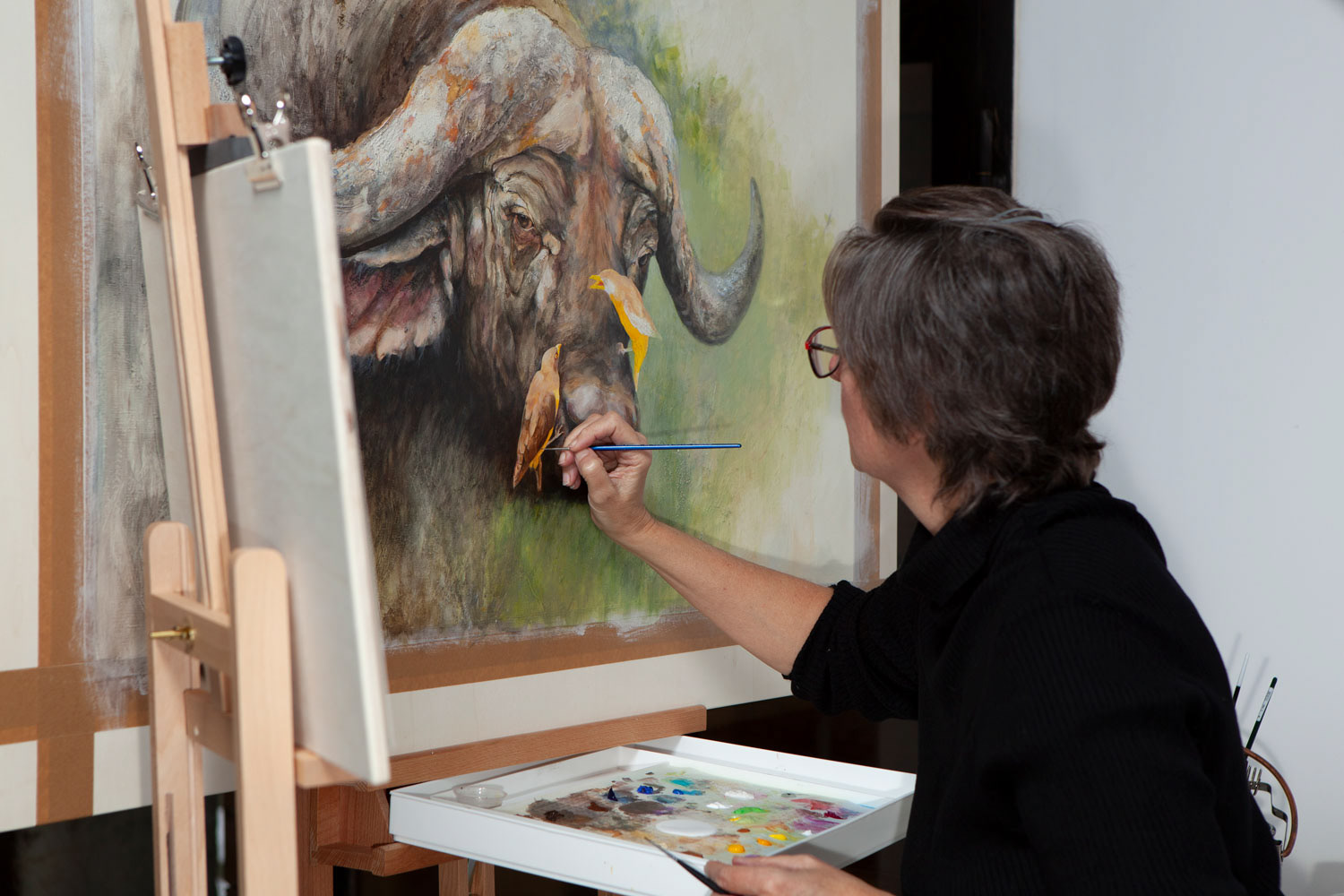 Georgina Tolmay painting a piece entitled Passive Aggressive