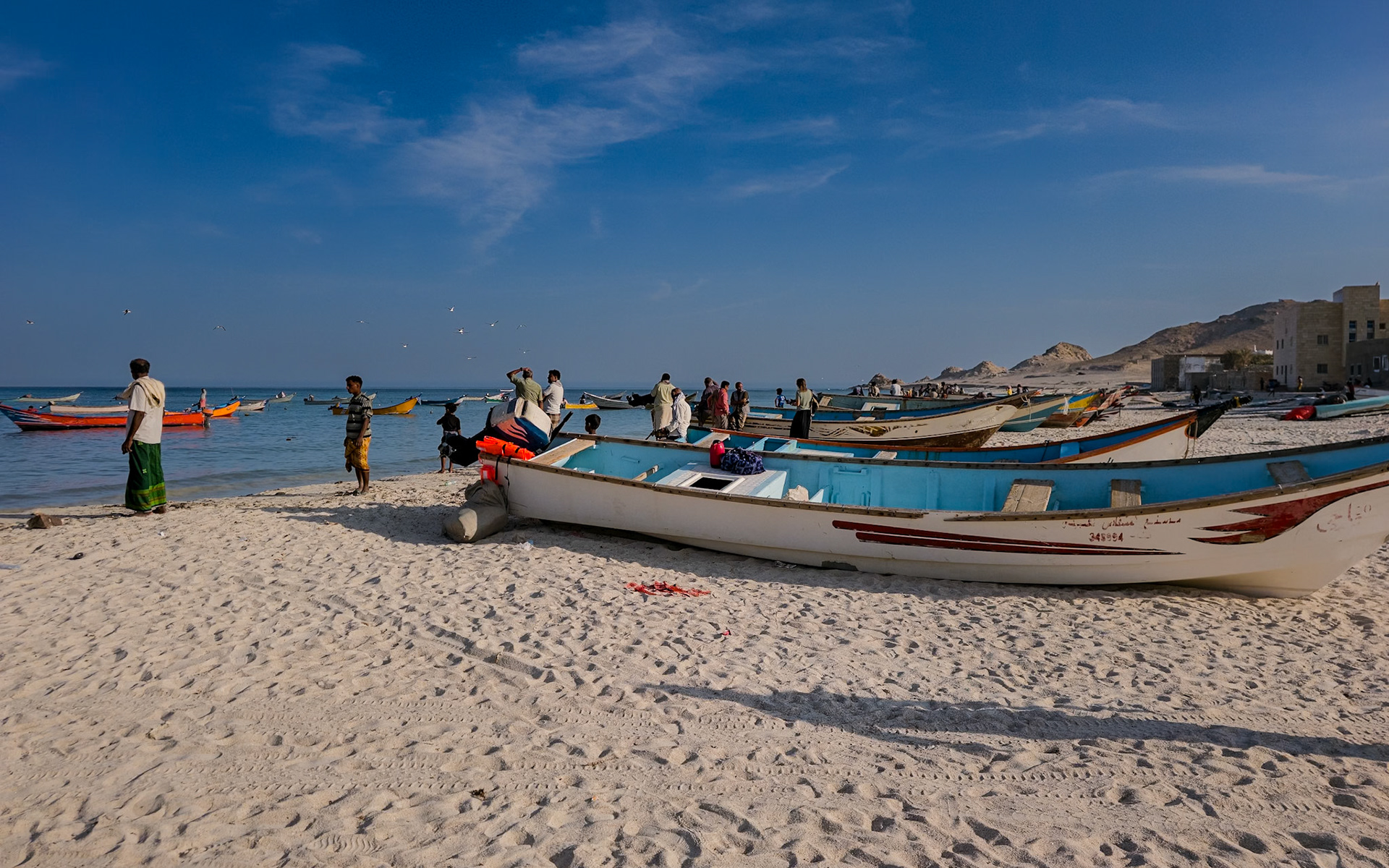 Readying the boats at Qalansiyah Beach