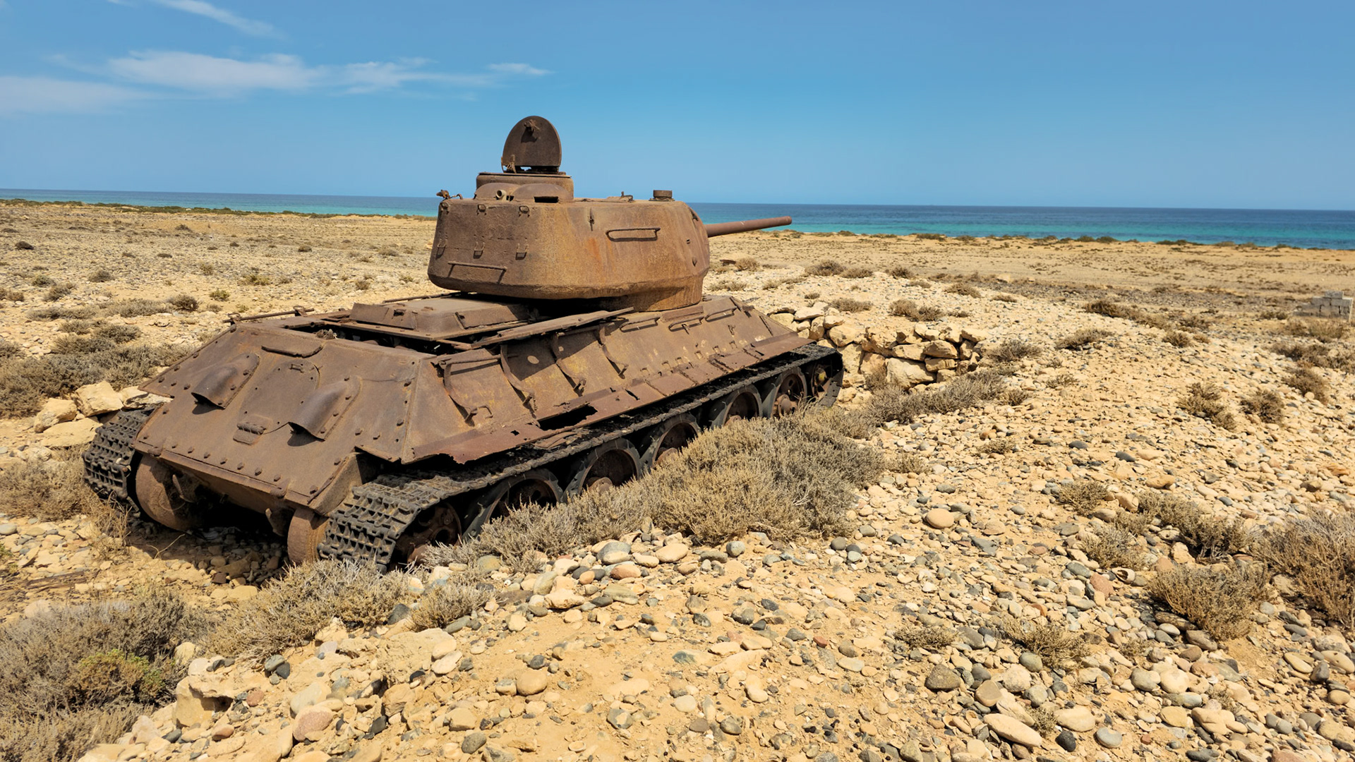 In the 1970-90s, Socotra Island was part of the South Yemen aka Democratic Yemen, which was a pro-USSR communist state (in fact, the only communist state on the Arabic Peninsula). To protect the island from any potential invasion from the mainland, the USSR gracefully installed several dozen old and rusty T-34 tanks (from the days of WWII), along the sand dunes of the north coast. Most were broken and couldn’t really operate other then just act as cannon guns facing the sea. Today, they are some of the first landscape objects da you get to see as you leave the Socotra airport and drive along the northern coastline.