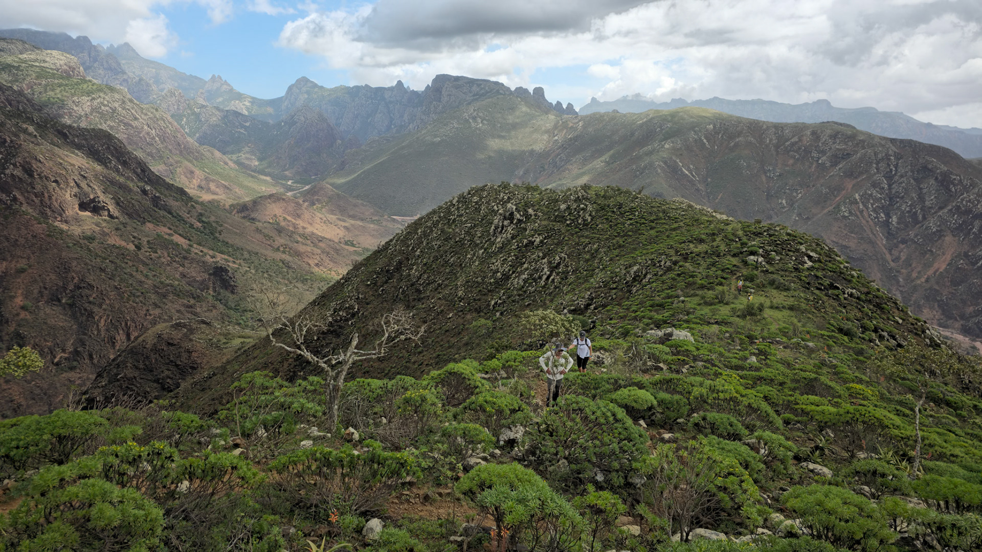Climbing to Rokeb di Firmihin highland plateau. Two days ago, we camped at Adho di Meleh Saddle, seen at the back of us.
