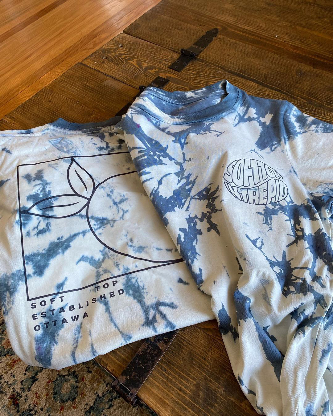 Front and back view of T-shirt utilizing designed element
