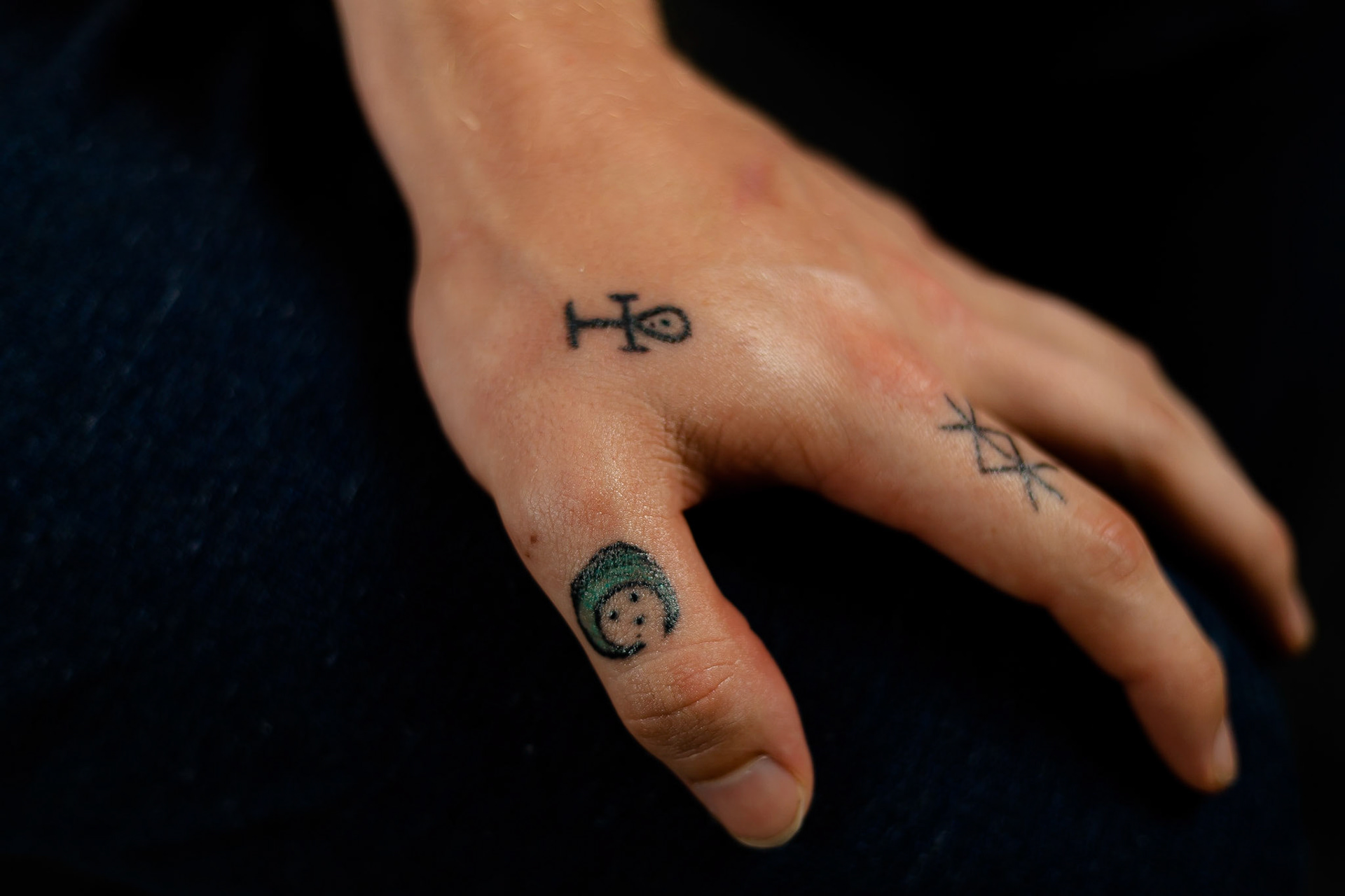 My hand tattoos: I tattooed these myself for practical magic and Ju-Ju business
