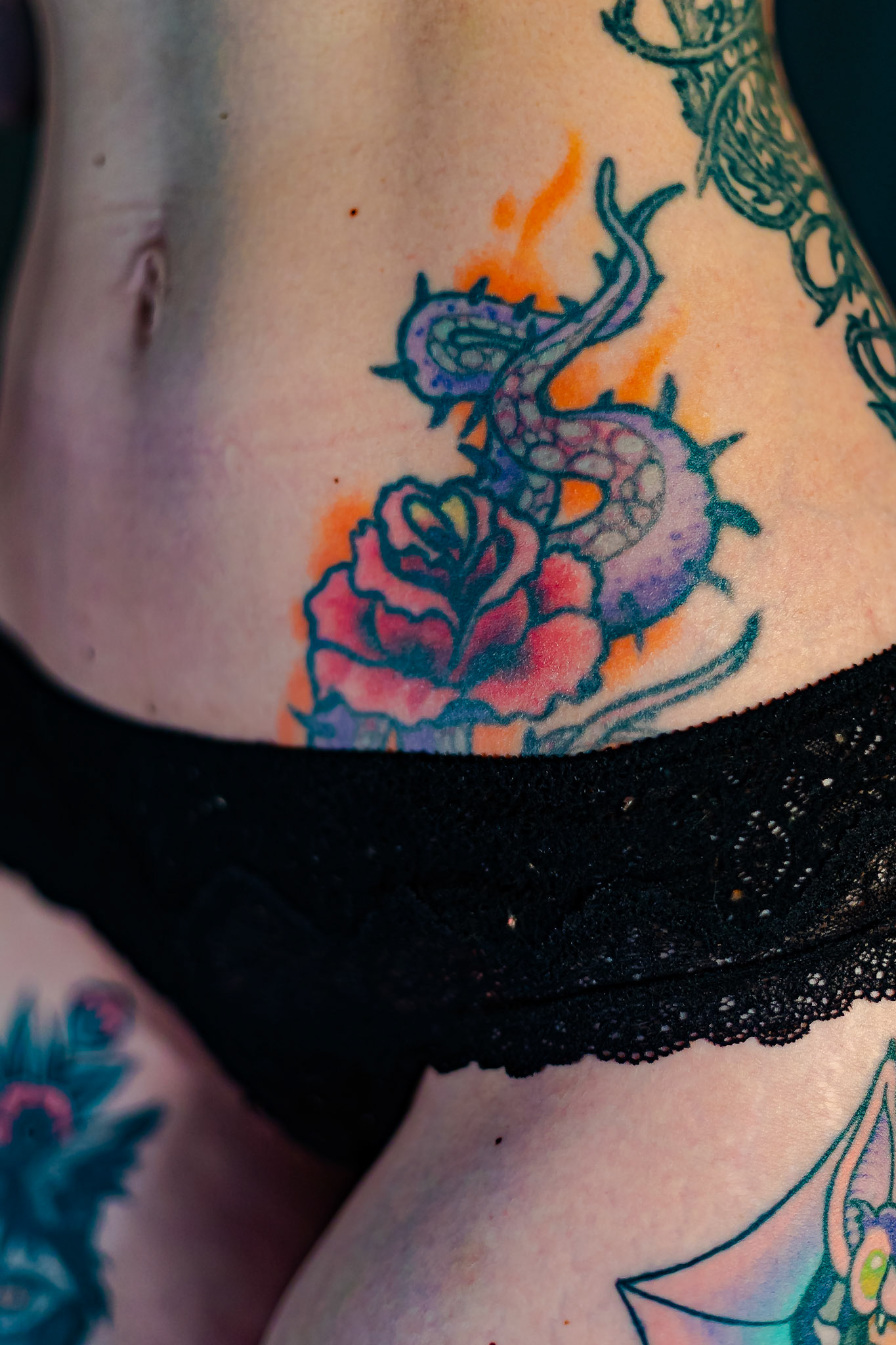 2nd tattoo was also a basement tattoo when I was 17 - the rose with octopus tentacles on my left hip. I had the color abs design touched up in a shops few years later. I didn’t want just a basic rose, so I added a Japanese/anime twist to make it more personal.
