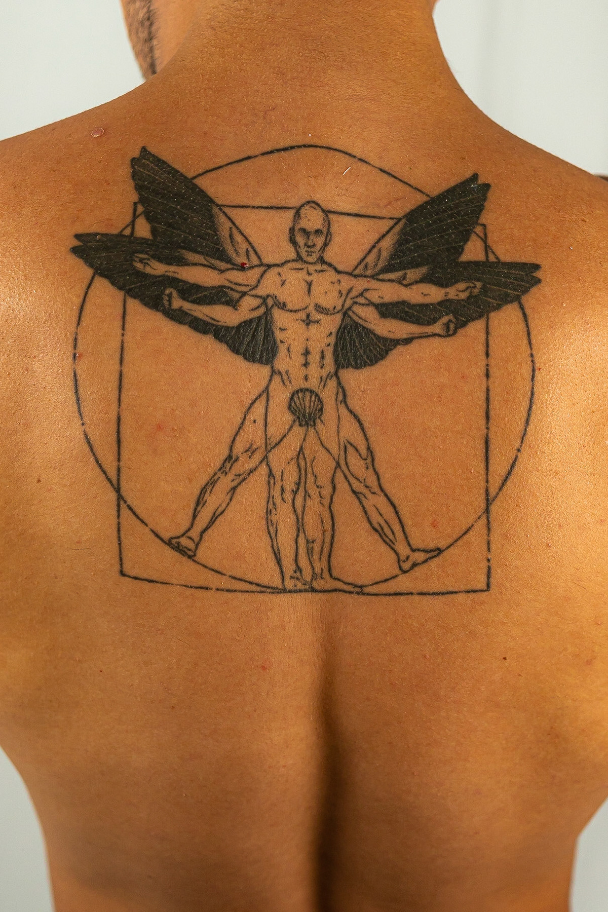 I remembered I was so young when I first saw this master piece of Leonard Da Vinci. I didn’t know the meaning behind it so when I was in college I did a project based on it as an assignment I was just mesmerized by it that I knew I wanted to have it on my body as a reminder to myself being an artist. I added the wings because I wanted to make it unique. I thought to myself “how can I give the meaning of DREAMER without putting the word there? So to me the wings just made perfect sense