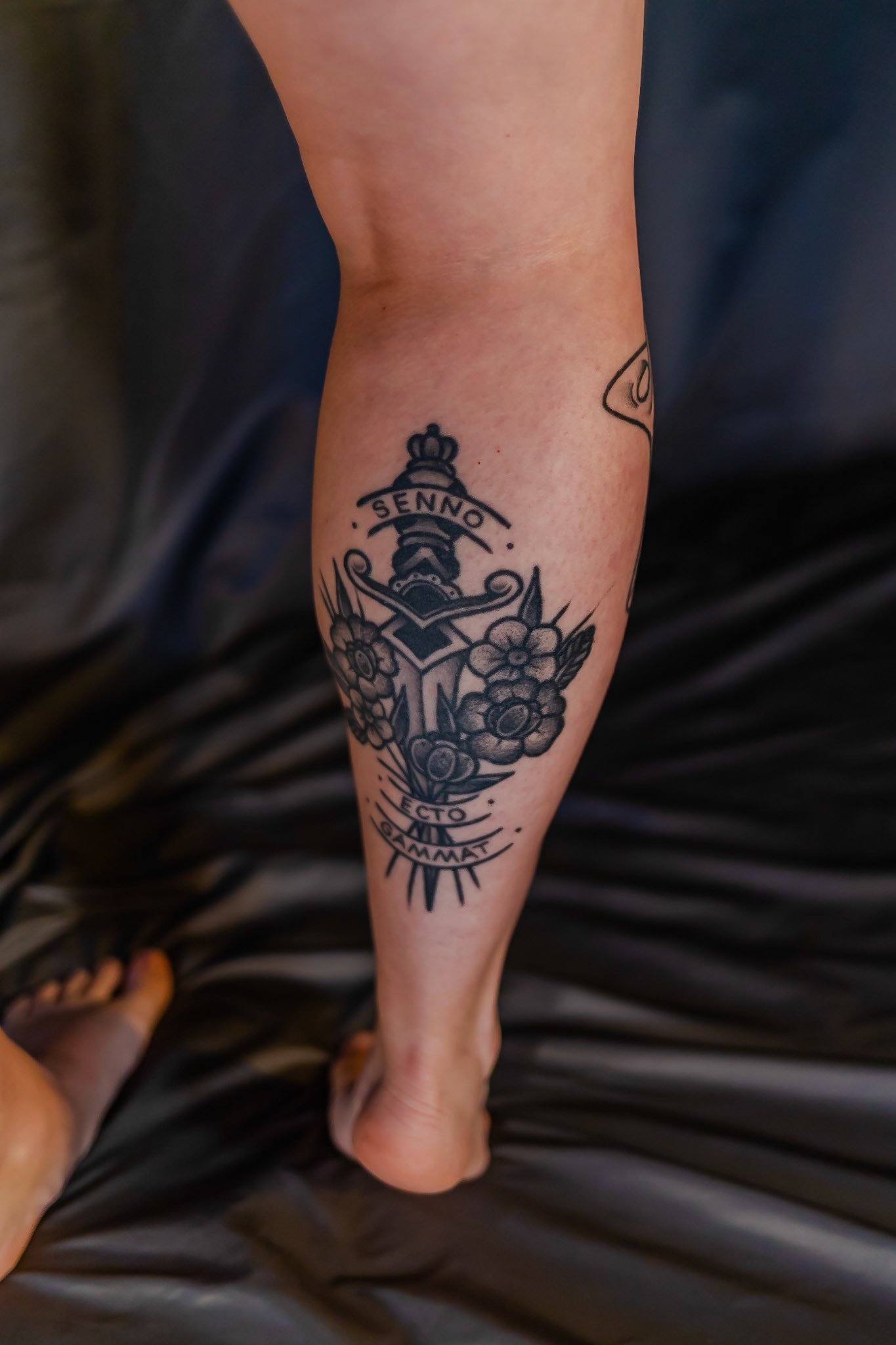This tattoo, unlike my more recent tattoos, does have a meaning. Anyone who has seen the movie The Fifth Element probably remembers the scene where Korben Dallas attempts to kiss Leeloo while she was sleeping. Leeloo wakes up, grabs Korben's gun and puts it to his head and says "Senno ecto gammat" repeatedly. When Korben asks Priest Vito Cornelius what this means, he roughly translates it to "never again, without my permission". I got this tattoo after a good friend of mine had planted a hidden camera in his bathroom to try to catch me changing. Thankfully, I caught it. This wasn't my first experience with S/A or a man attempting to, or actually taking advantage of me. It was however the first time one of my close friends had. I was devastated. I was angry. And I tattooed this promise to myself into my skin, that I wouldn't allow anyone to take advantage of me like that again. Never without my permission.