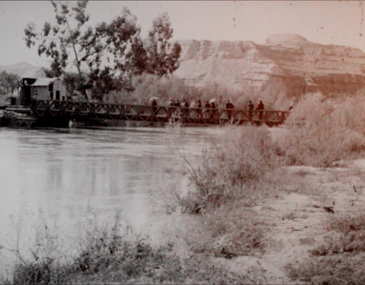 Jordan river and King Hussein bridge crossing between Jordan on the East side and Palestine on the West side