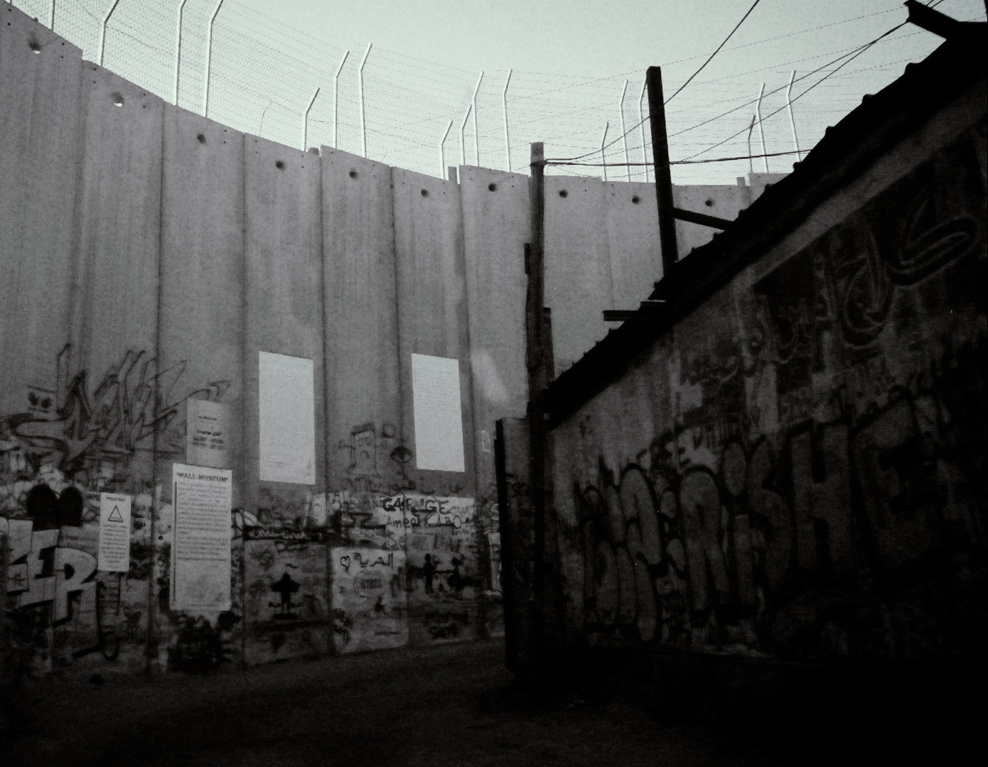 Separation wall in Bethlehem. The view of the mountains that I used to see as a child is no lobger visible. living