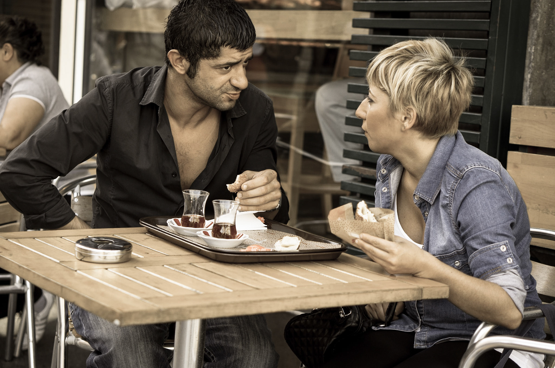 Couple drinking tea and eating in downtown Istambul
