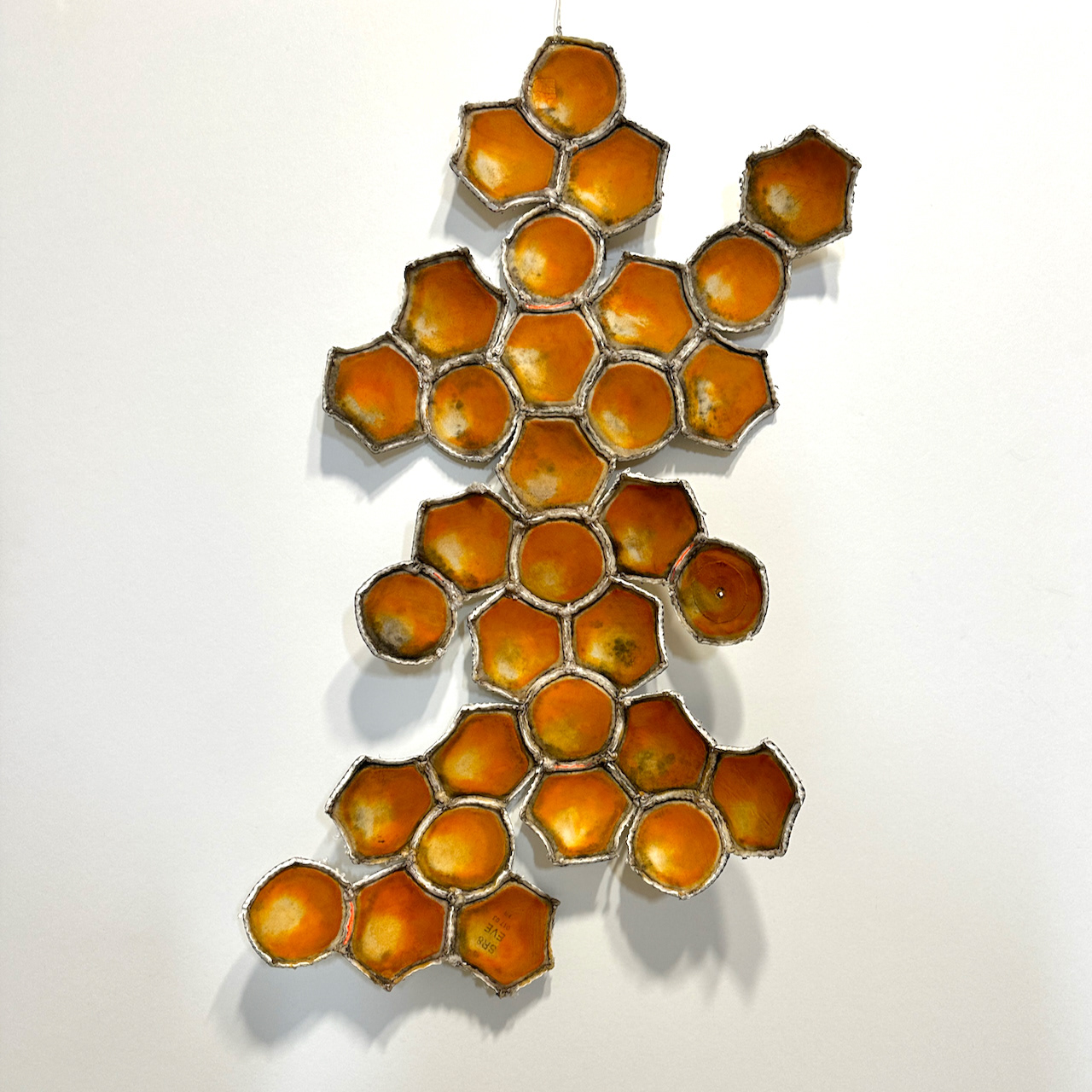 Tessellation # 3, 2023, Deconstructed soccer ball, acrylic and oil paint,  28” x 19” x 2” – SOLD