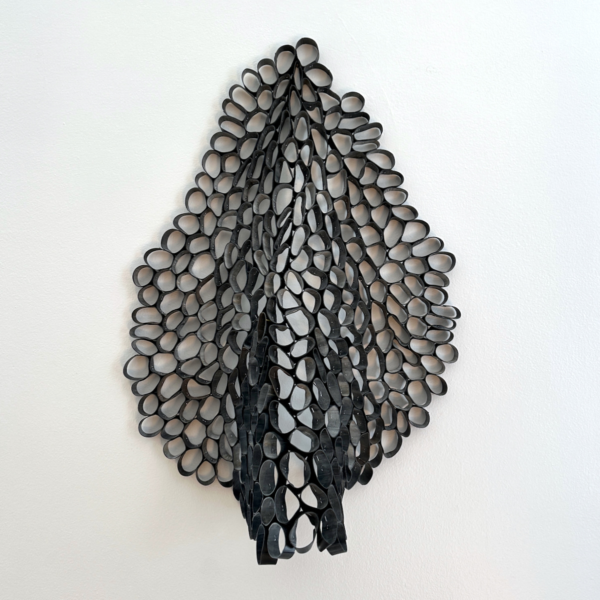 Soft Sculpture #6, 2023, Inner tubes and staples, 26" x 19" x 7"