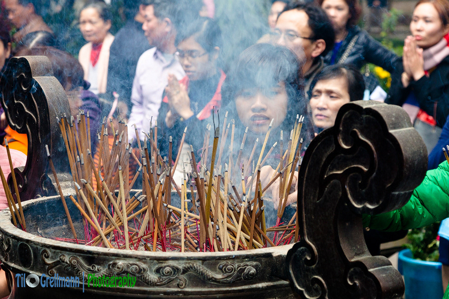 Believers in the temple for the New Year (Vietnam)