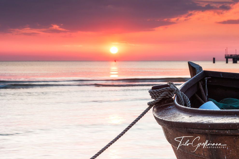 fishing boat at sunrise