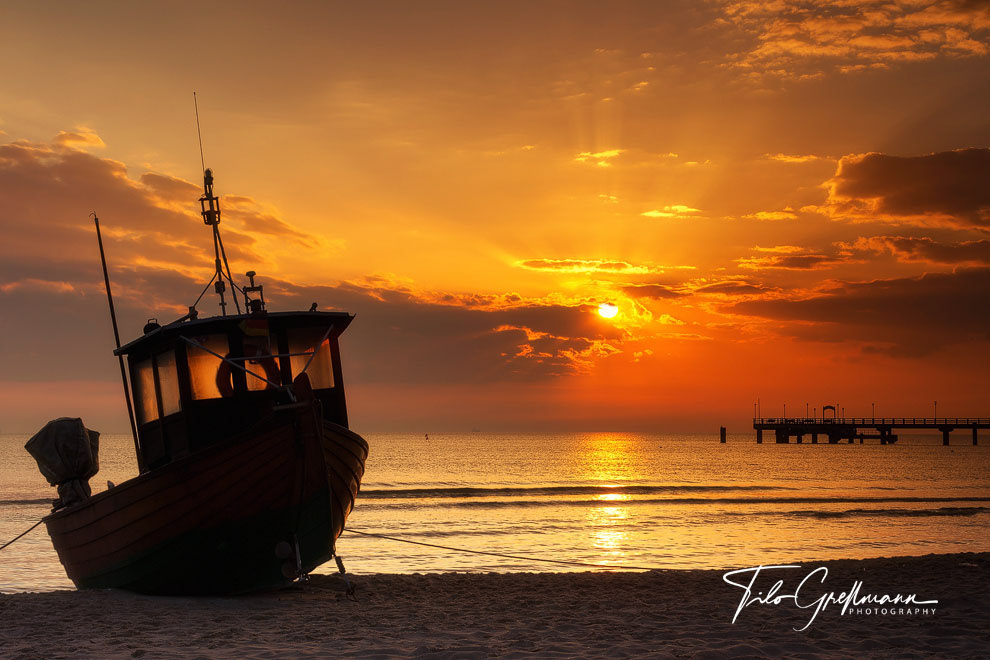 fishing boat at sunrise