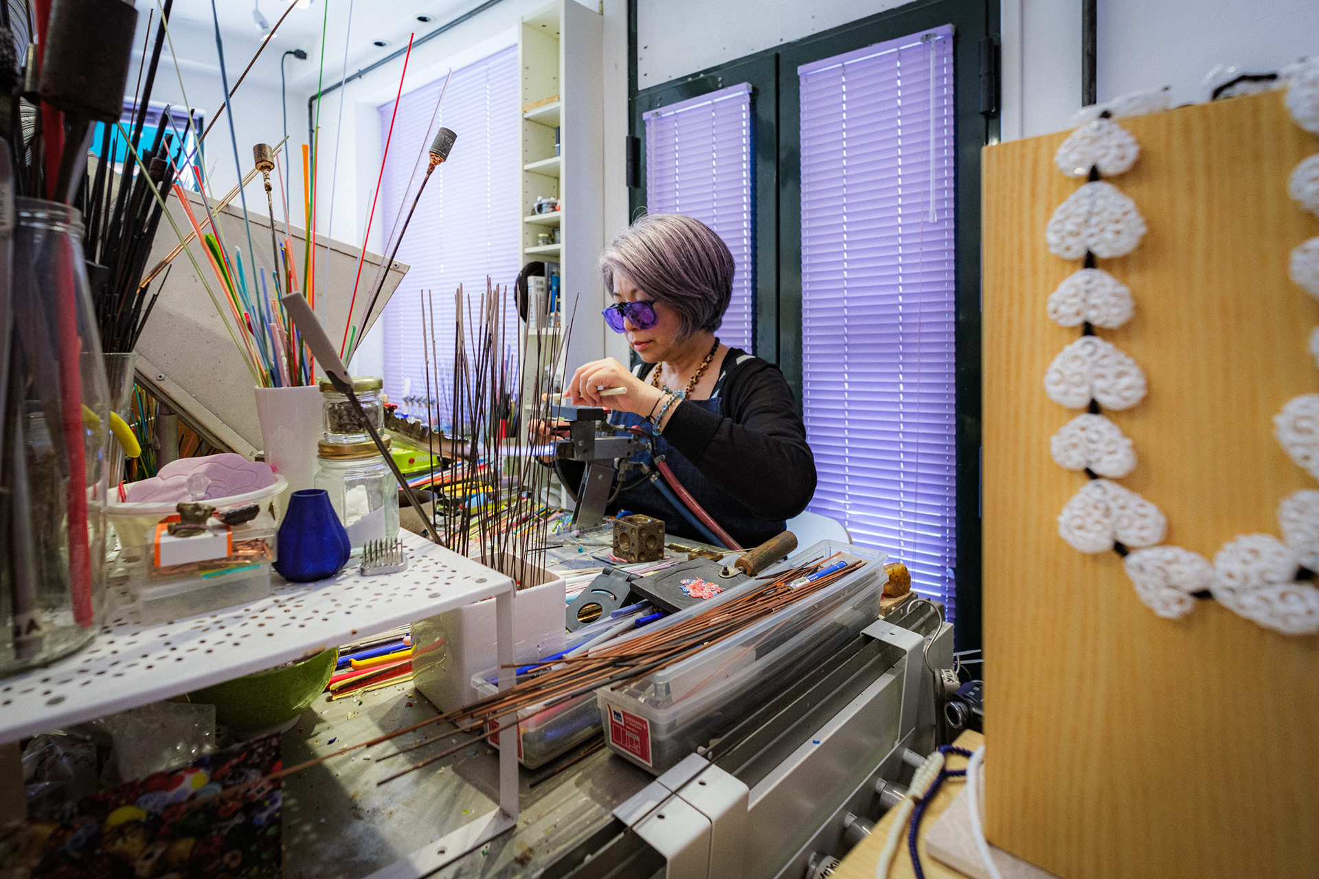 Murano, Italy. Yukina Fiorese works using the lampworking technique to create original glass beads – 1/250 sec, f. 3.2, ISO 1250 – 10 mm.