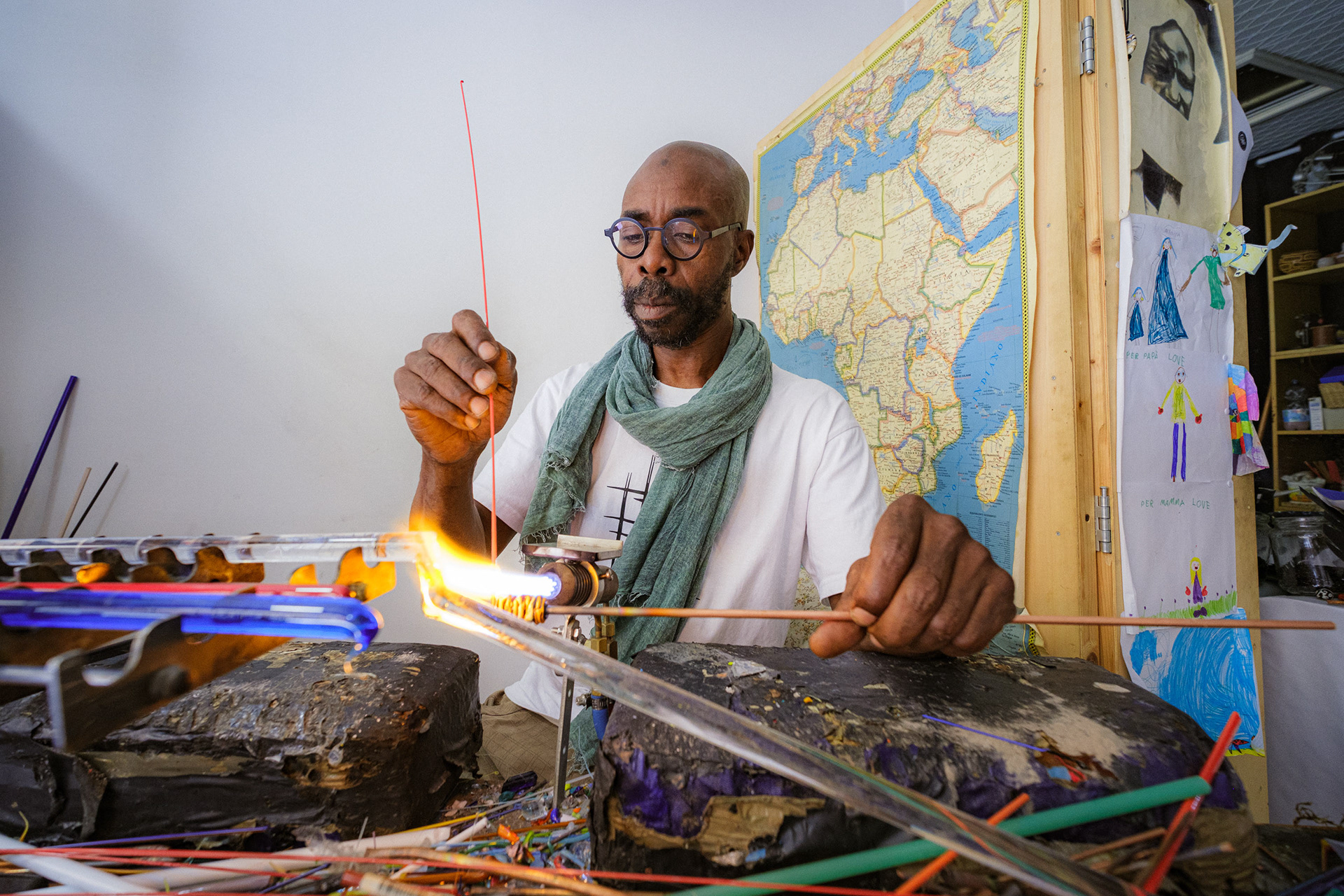 Moulaye Niang, a craftsman and artist originally from Senegal, moved to Venice to learn the secrets of glassmaking – 1/100 sec, f. 3.6, ISO 800 – 10 mm.