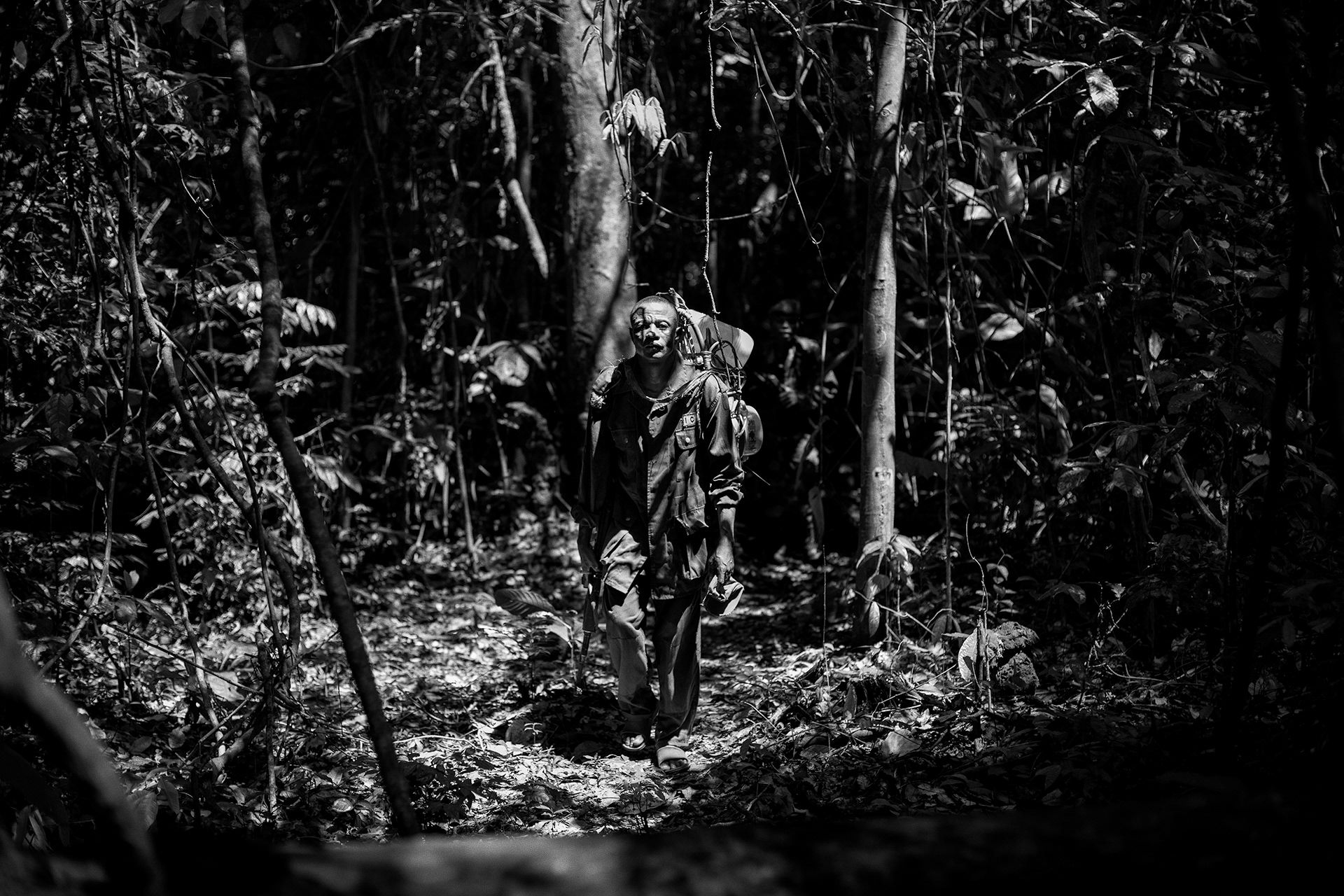 Salonga National Park, Tshuapa, October 2016. A joint patrol of the Congolese Institute for Nature Conservation (ICCN) and DR-Congo Armed Forces (FARDC) in the Salonga National Park during an anti-poaching operation. The arrival of poachers armed with heavy weapons in the seventies led to a particularly brutal elephant slaughter episode. To secure and stop environmental crimes in this jungle bigger than Belgium, home of the bonobos and forest elephants, the ICCN sought help from the army.