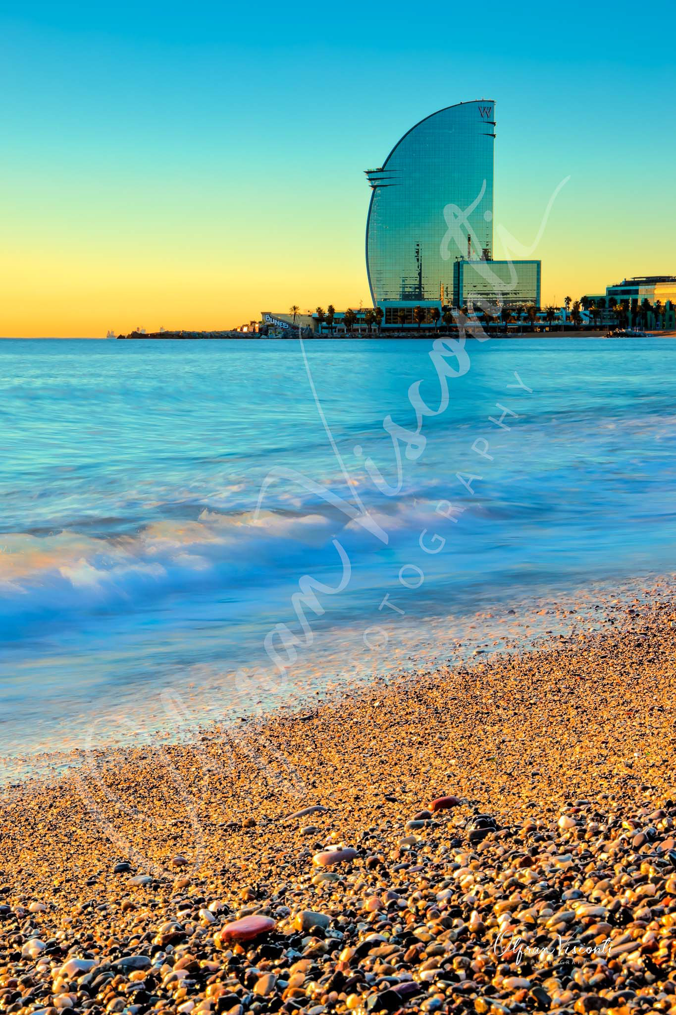 96. Beautiful sunrise at Barceloneta beach.