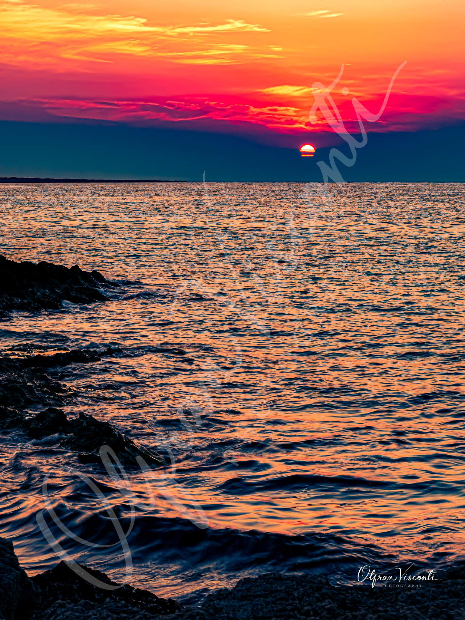 19. Colorful sunset at Punta della Suina. Puglia. Italy.