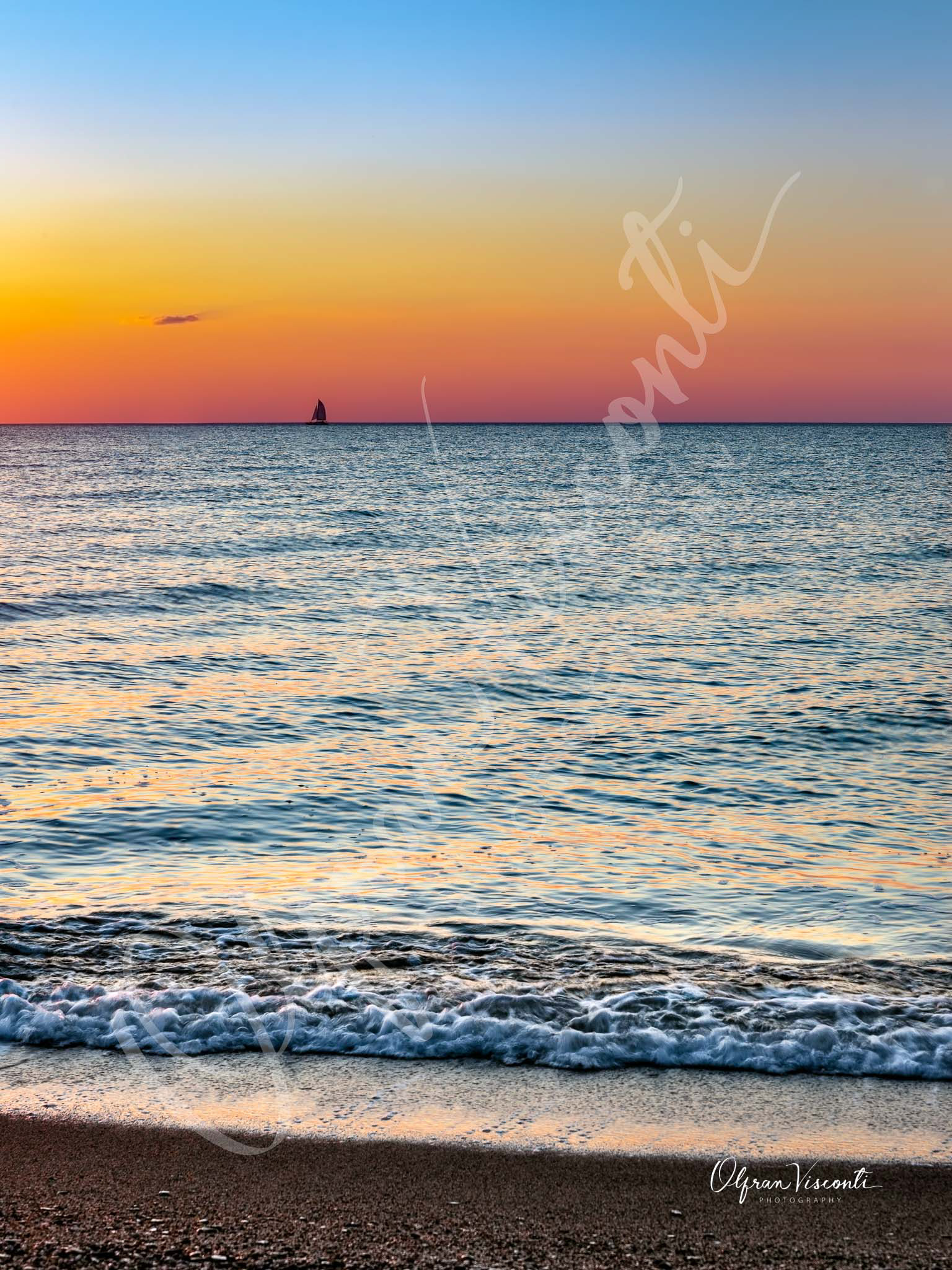 13. Lonely sailboat at sunrise. French Riviera.
