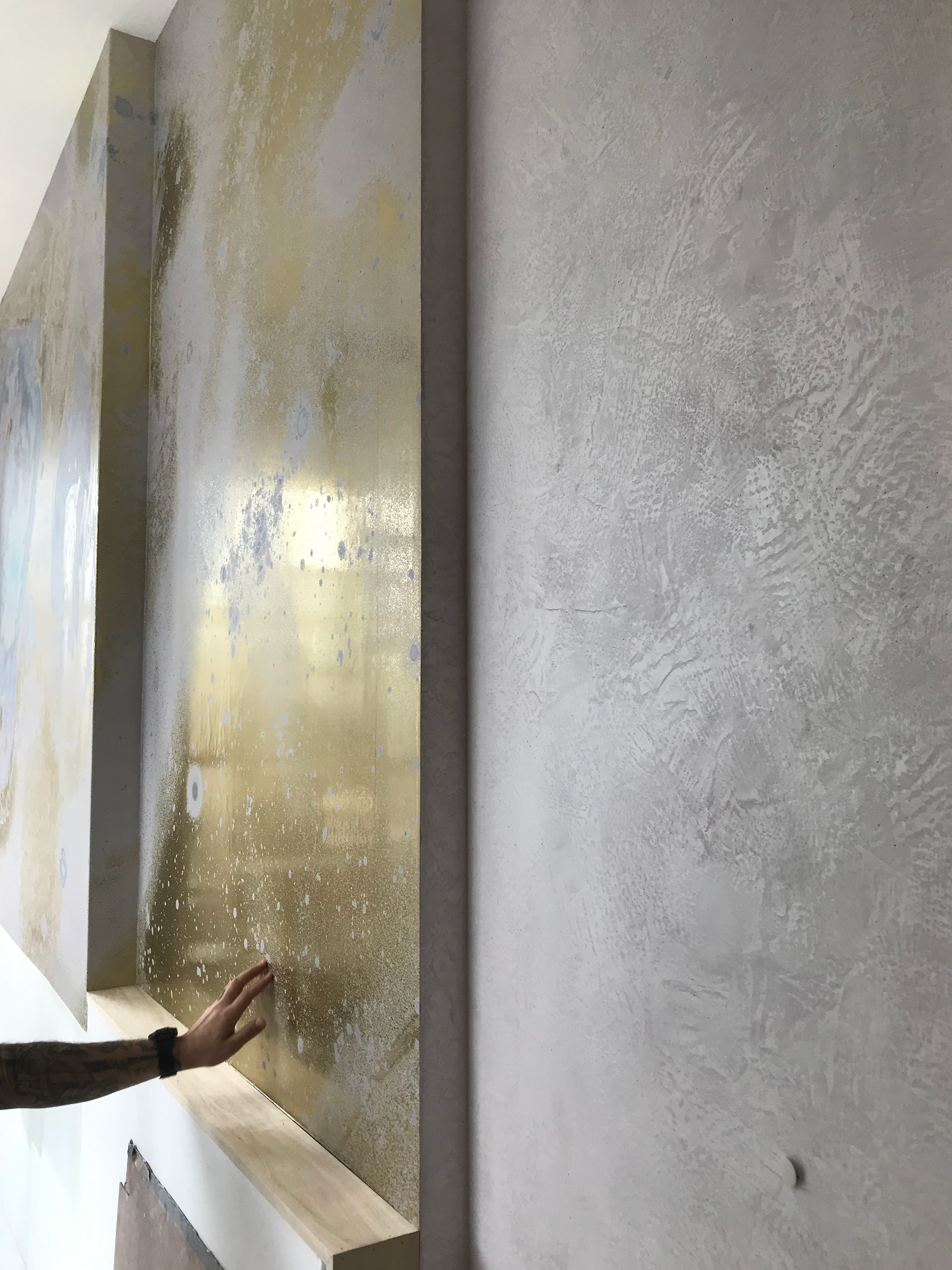 A specialty plaster finish we installed next to Calico Wallpaper