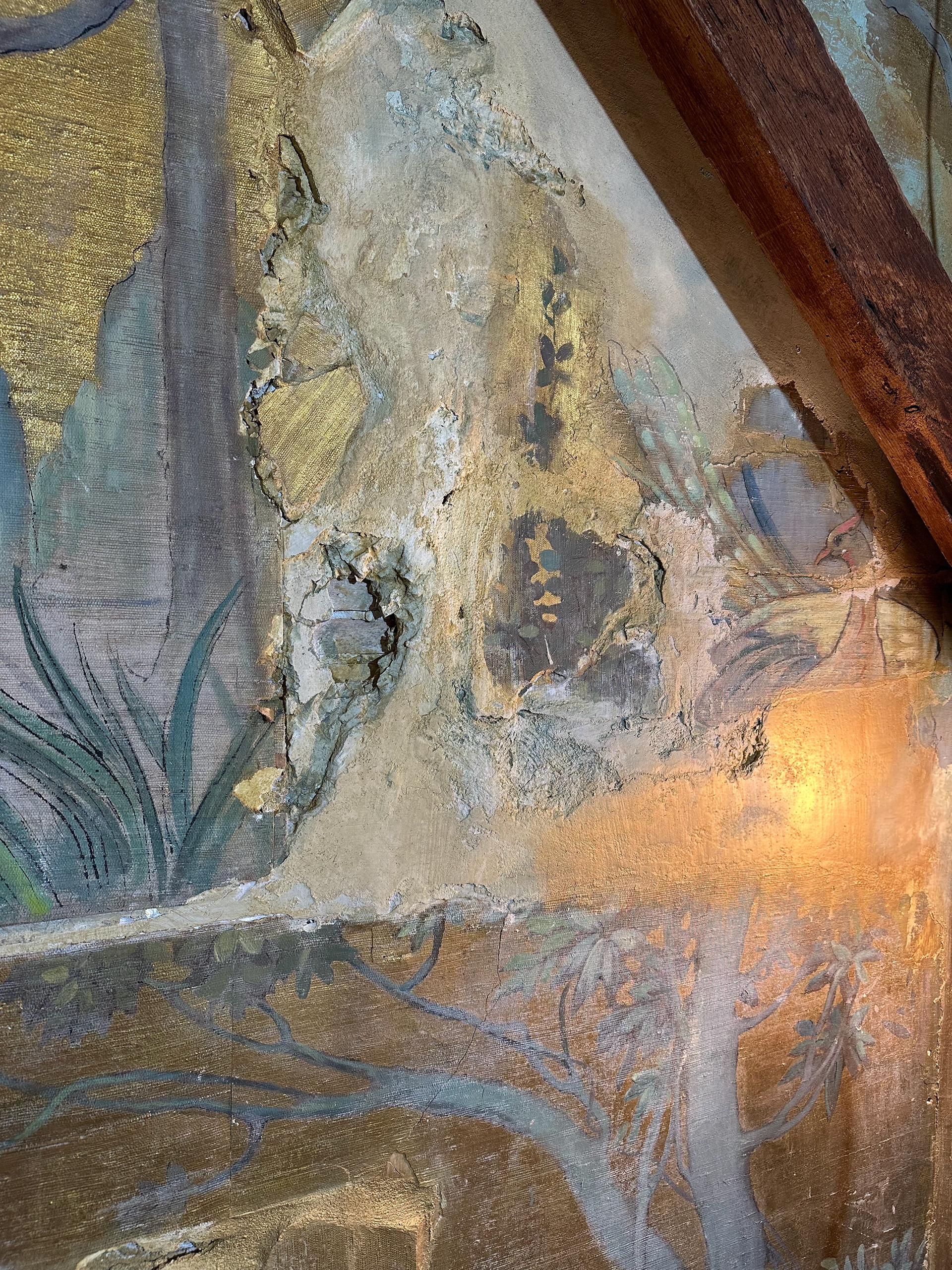 Using fragments of a mural salvaged from demolition, my team and I built a fresco wall and painted elements to unify the fragments across the wall.  Plaster, gold, paint.  Private residence, New Jersey