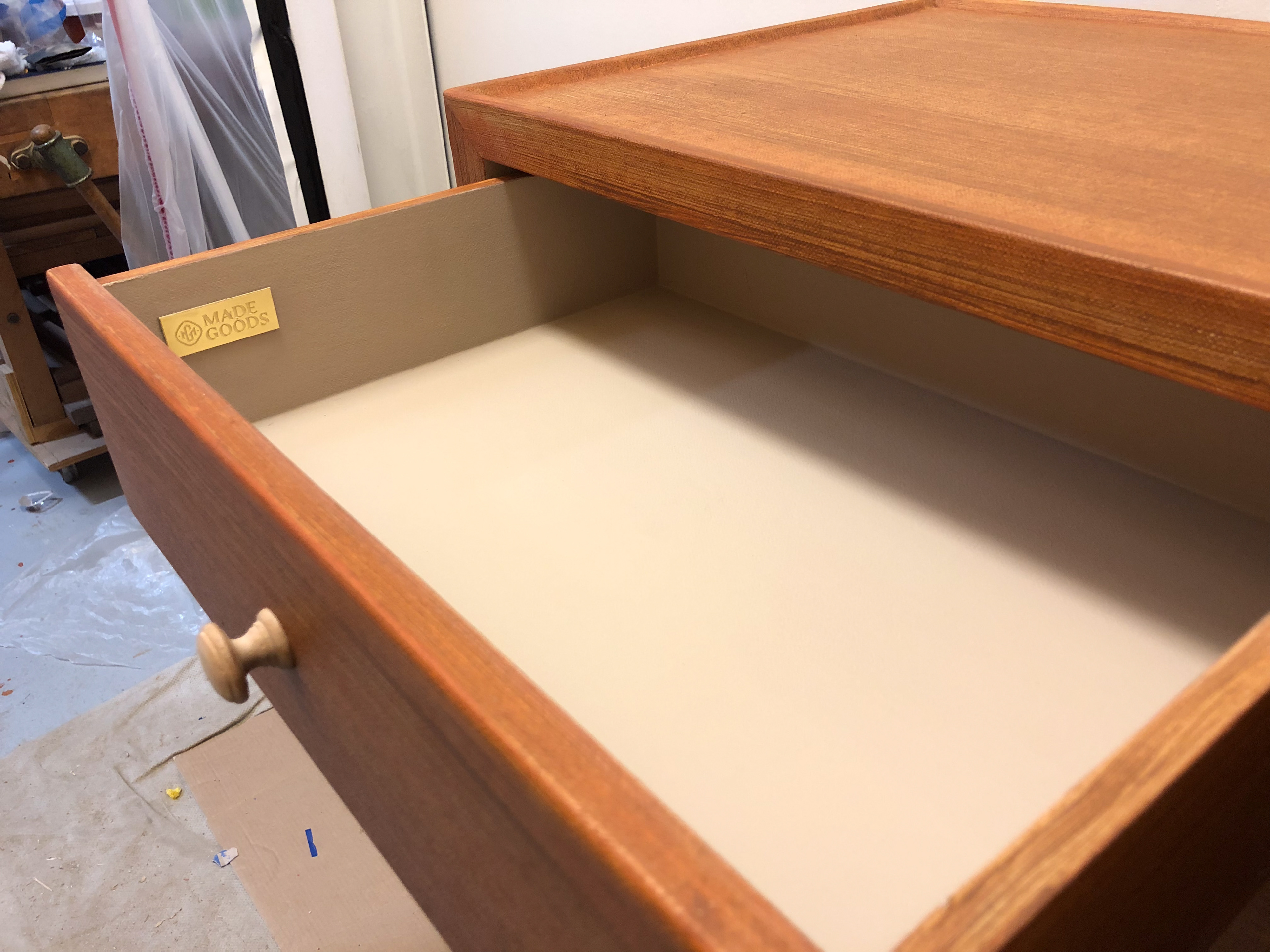 Oak base interior inside the drawers.