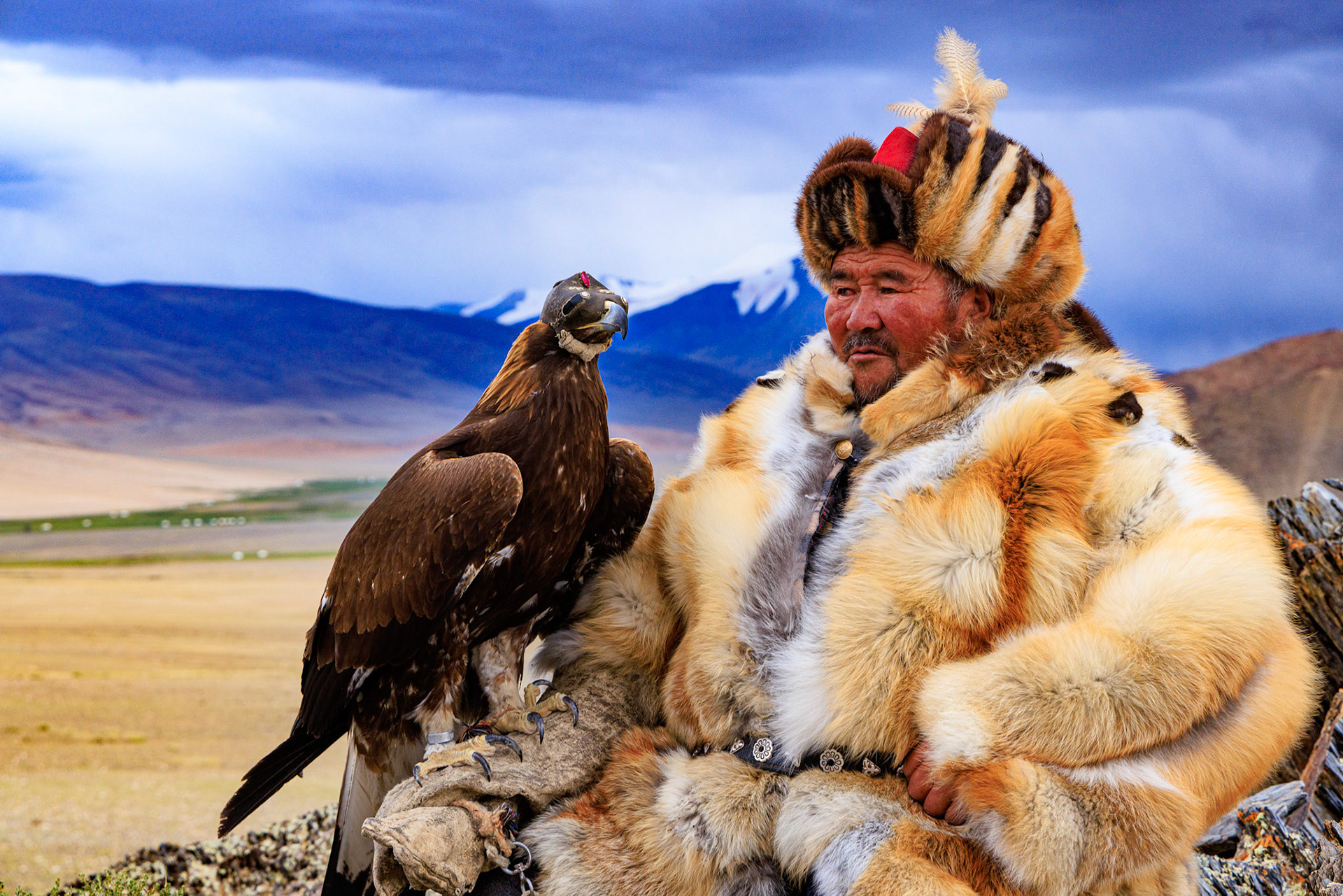 Portrait of Kazakh Eagle Hunter Sailua and his eagle