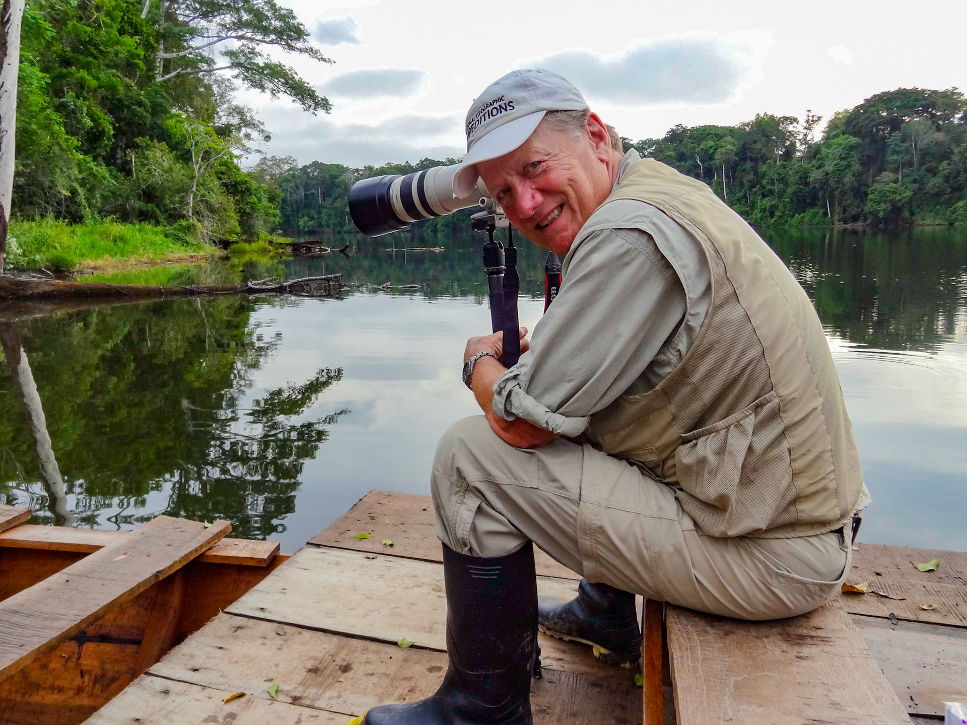 Wildlife photographer Ken Zaremba posing for the camera, Cocha Salvador, Manu National Park, Peru