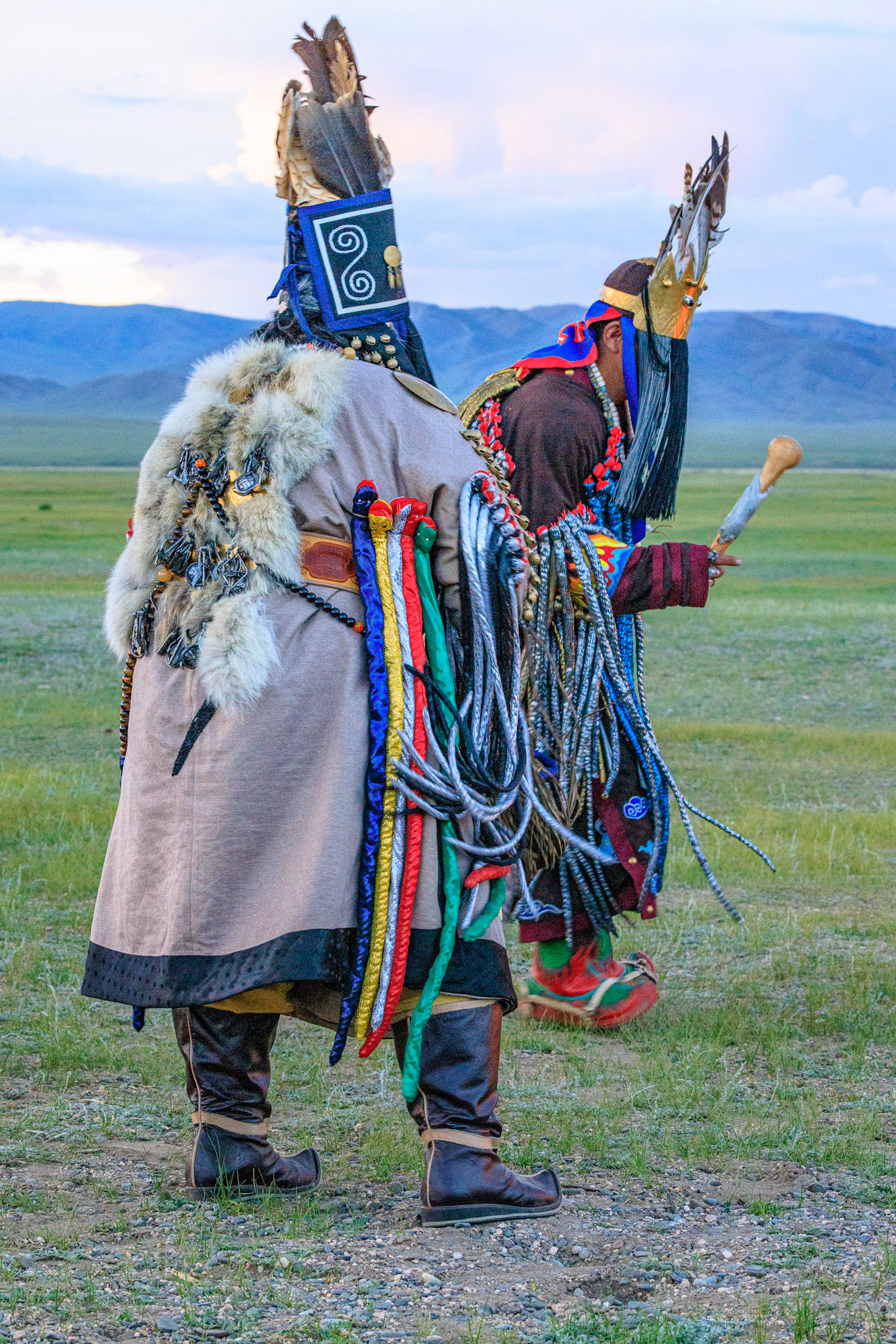 Elaborate costume of a female and male Shaman