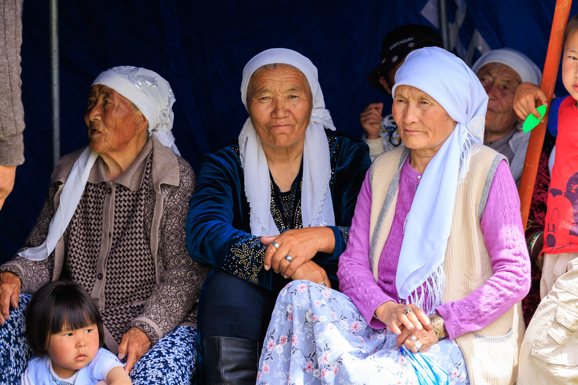 Family matriarchs pondering what the bride is about to endure?