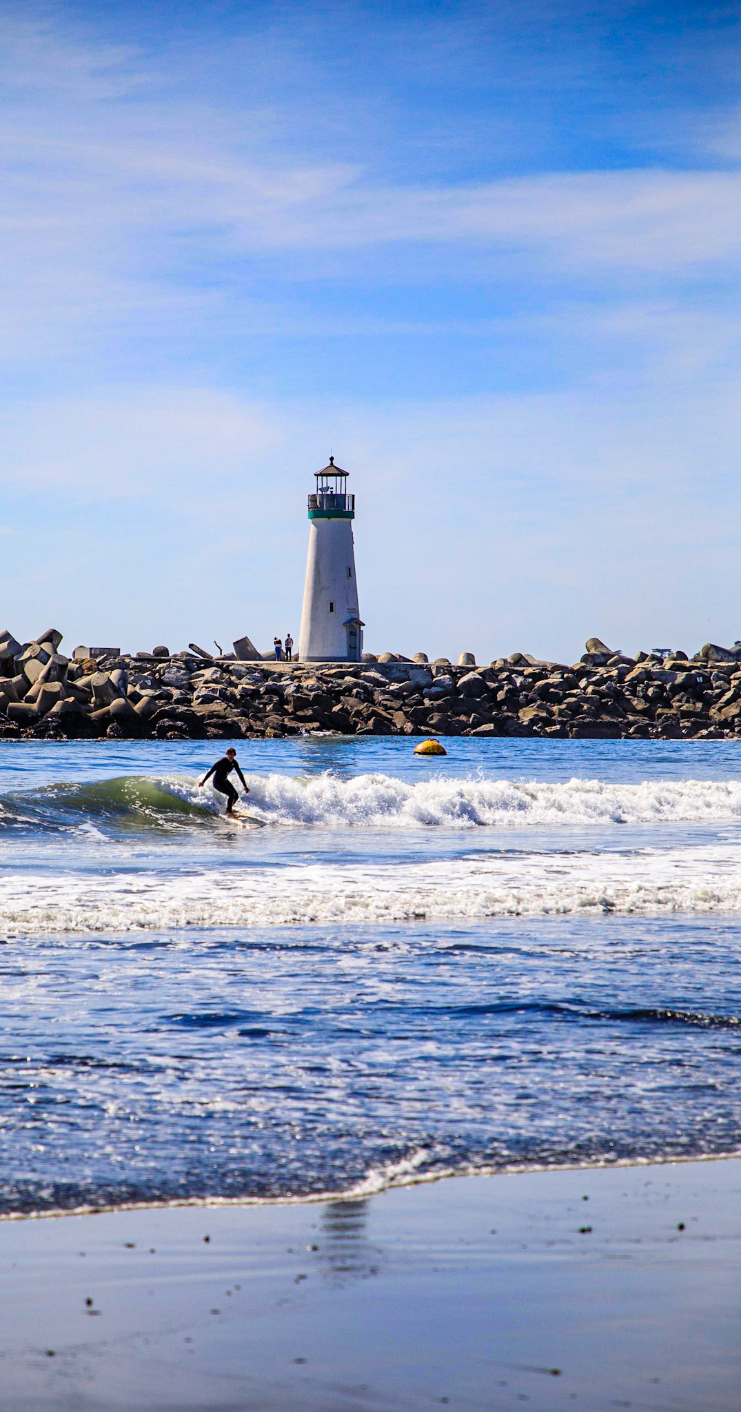 Walton Lighthouse at the harbor entrance, Twin Lakes Beach