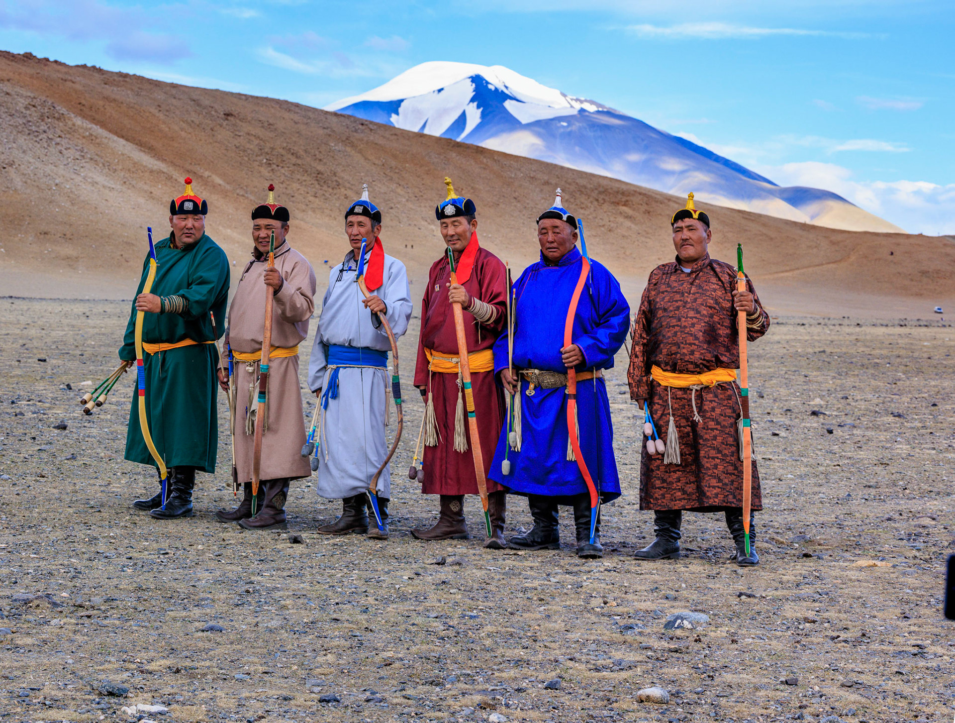 Top archers as noted by head gear and neck scarf