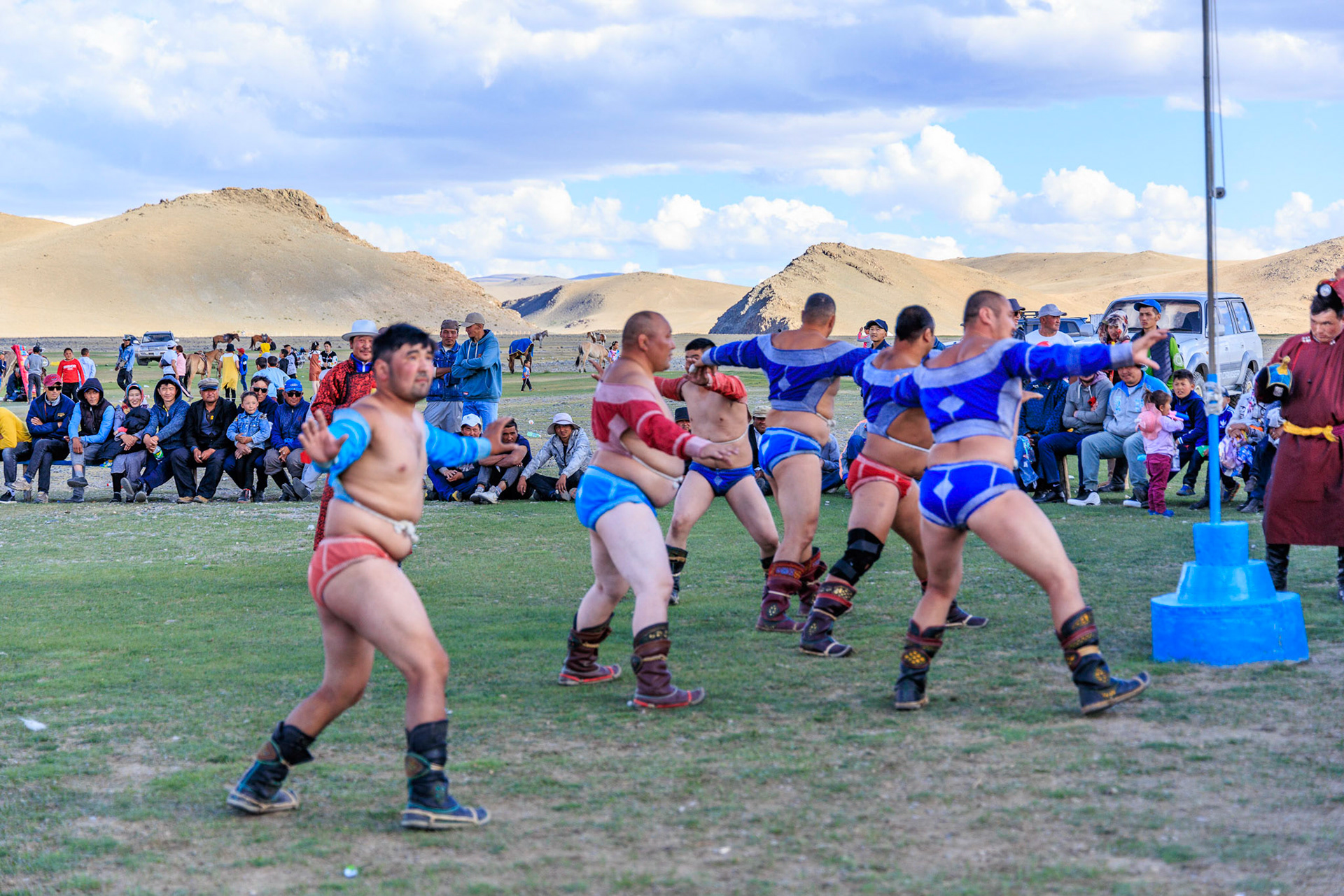Altantsögts community Nadam Festival winning wrestlers parading in their speedos