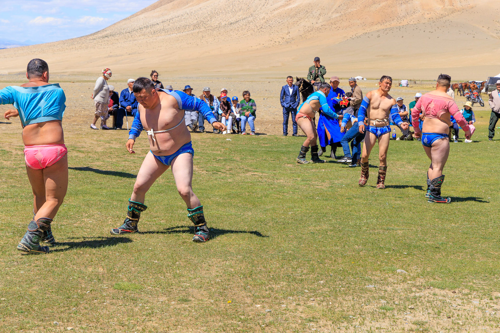 Archery, horse racing and this is the third leg of Nadam festival events, wrestling!