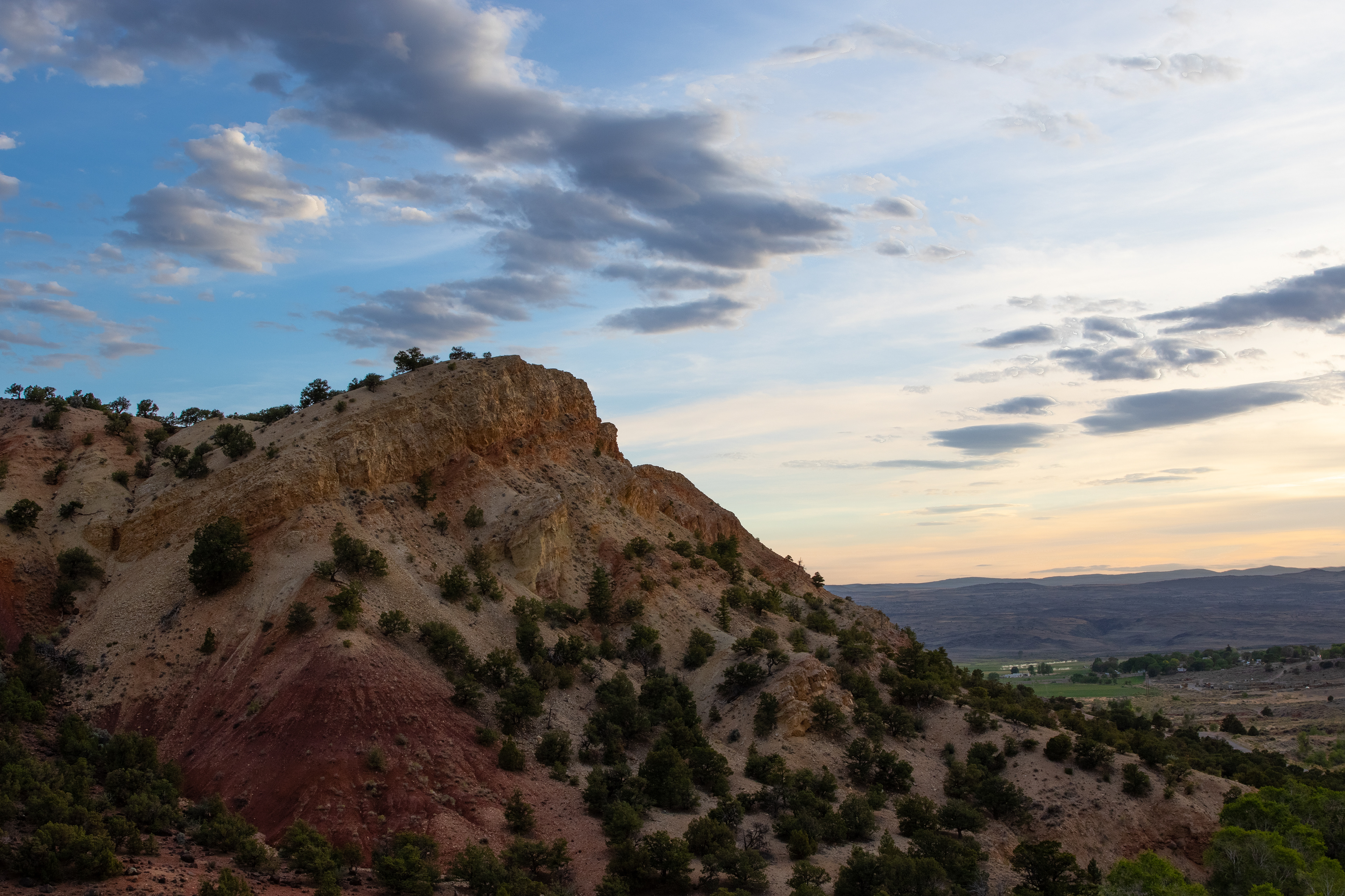 The setting sun sheds a soft light over this Utah landscape.