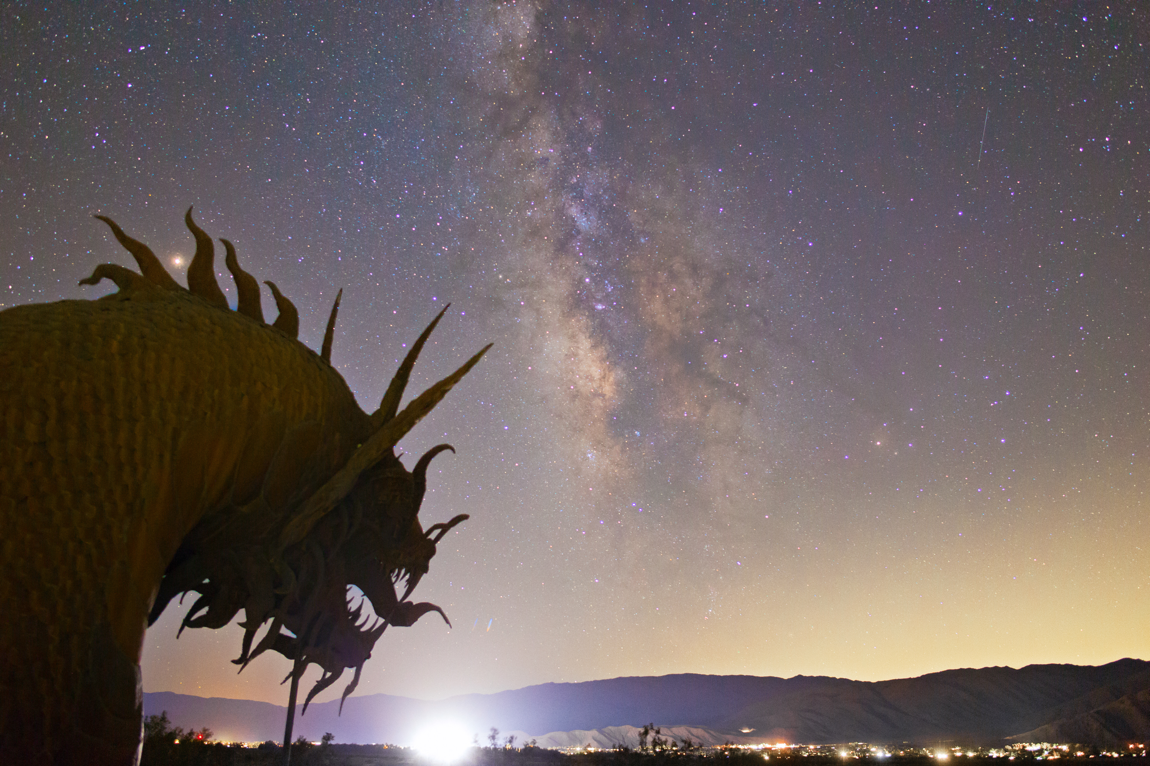 The head of the massive dragon statue in Borrego Springs looks toward the core of the Milky Way.