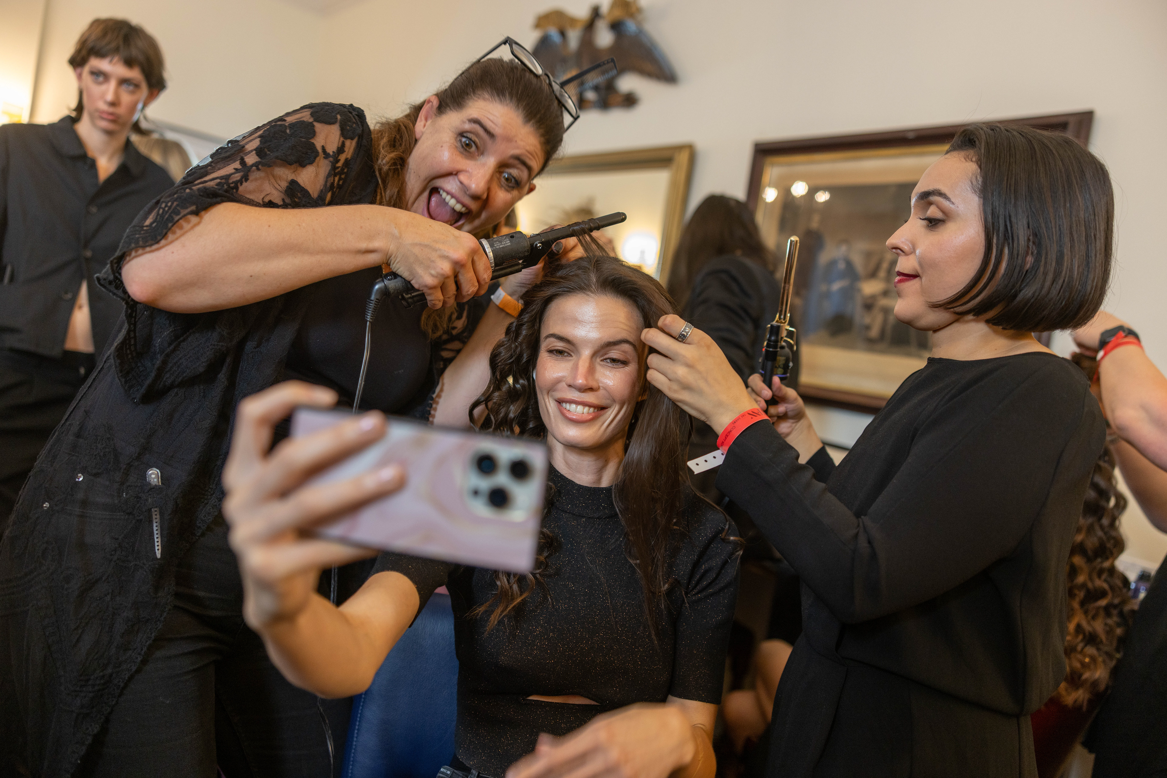 Michaela Vybohova has her hair done in the hair and makeup room during Victor De Souza's NYFW show. September 12, 2023. (Danny Arensberg / WSN)