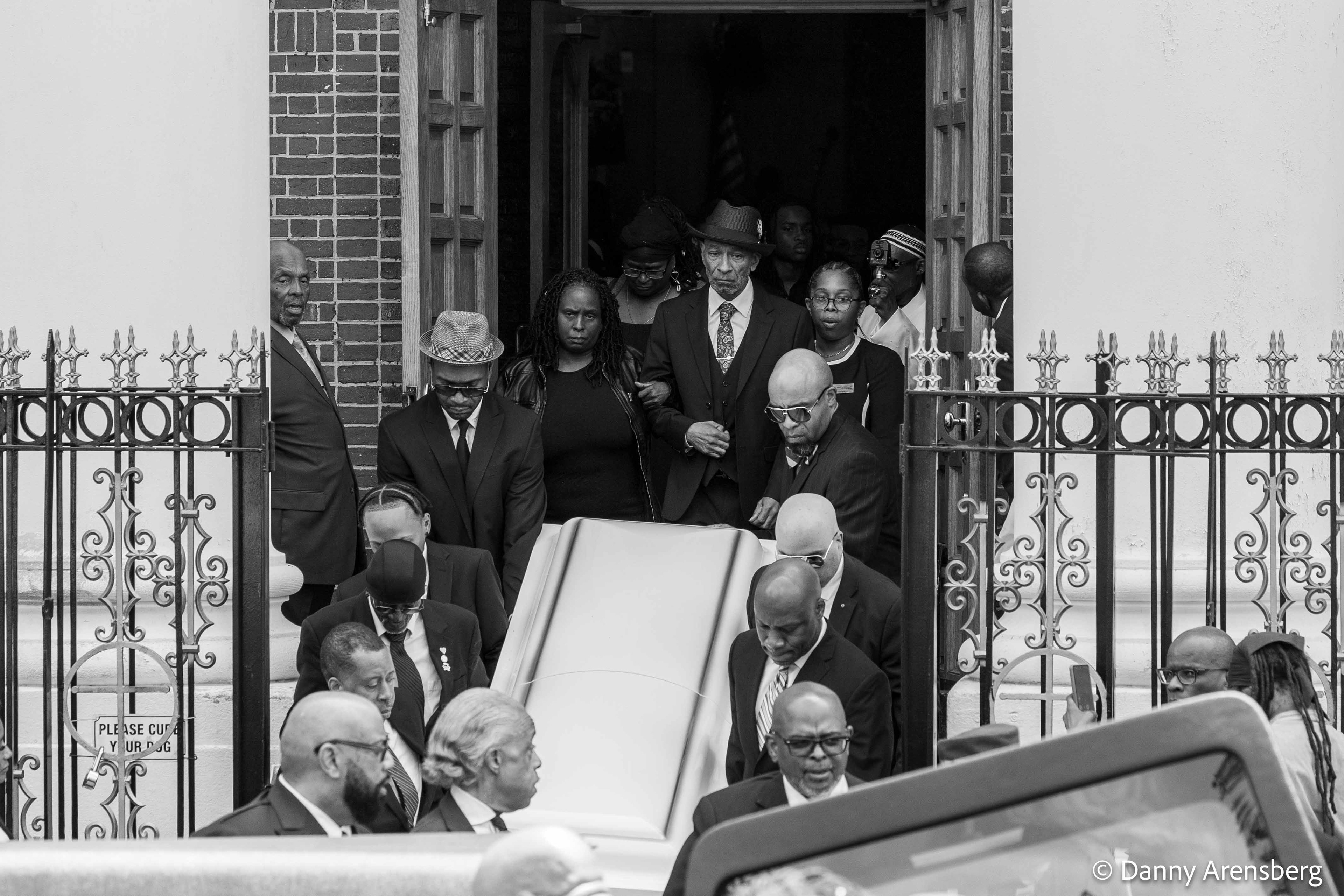 May 2023: Jordan Neely's father Andre Zachary exits the church with the procession