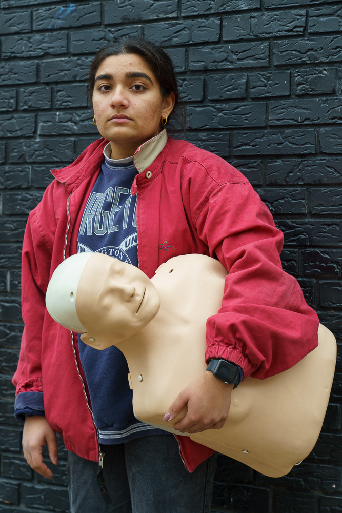 Sabreen is a student at Georgetown University who has been working at HIPS the past semester. On this day, she was teaching a CPR training. (December 2023)
