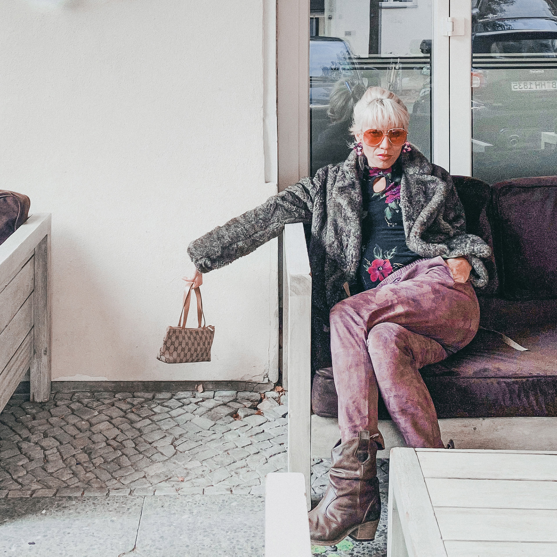 Ninoschka showing off Louis Vuitton bag