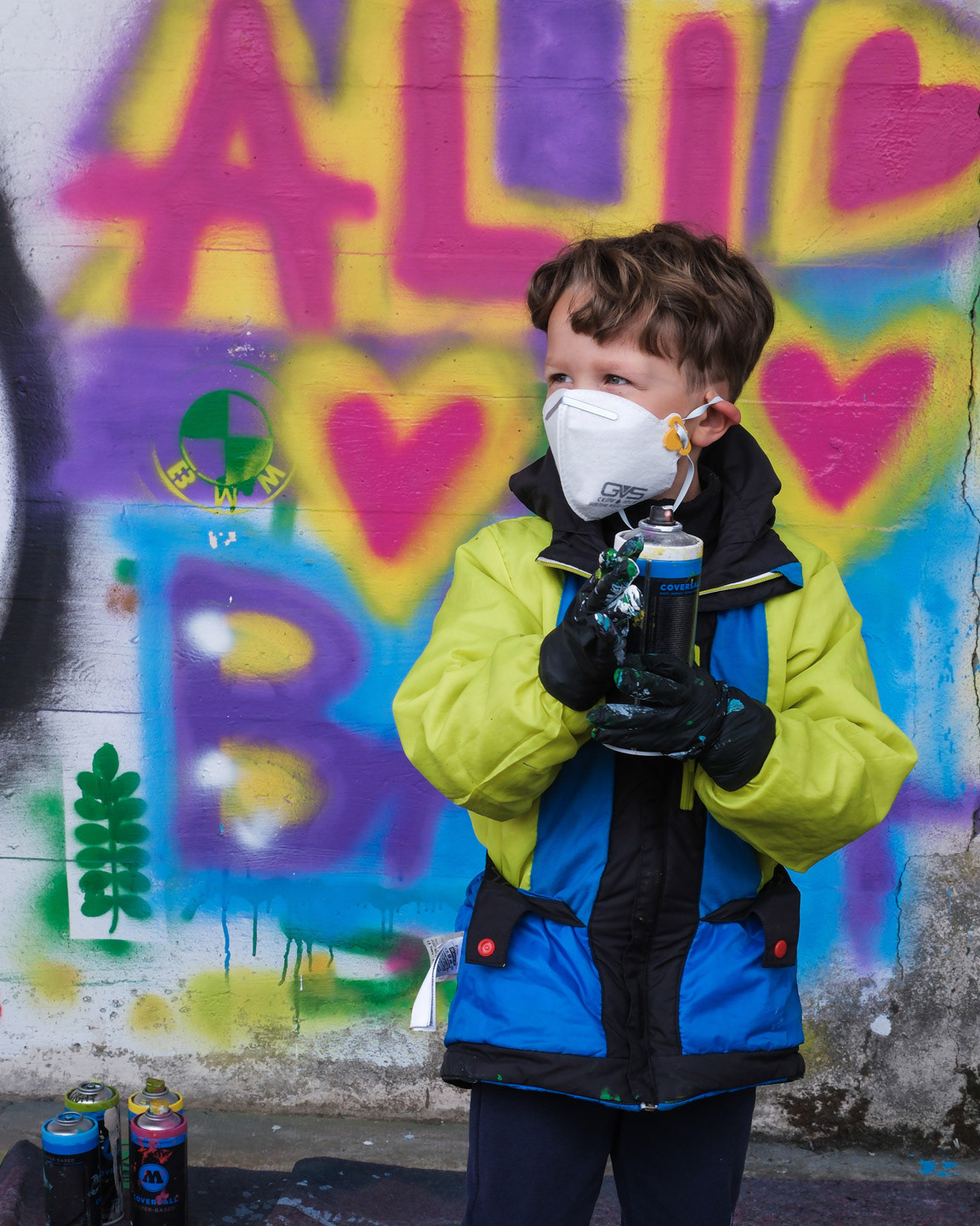 Child using spray paint