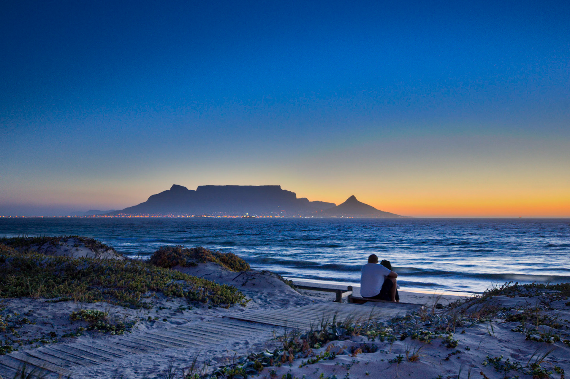 A Couple Watching the Sunset at Bloubergstrand, South Africa (SA067)