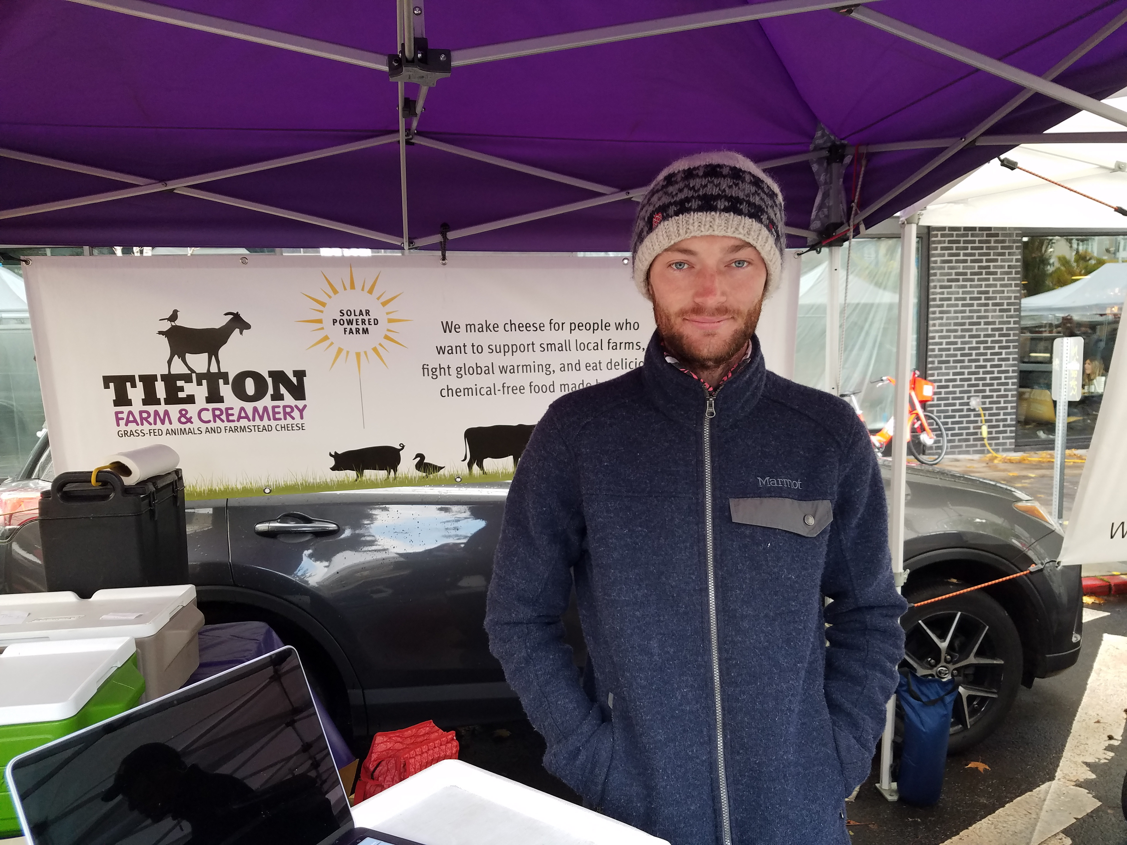 Meat, dairy and egg farmer at the market
